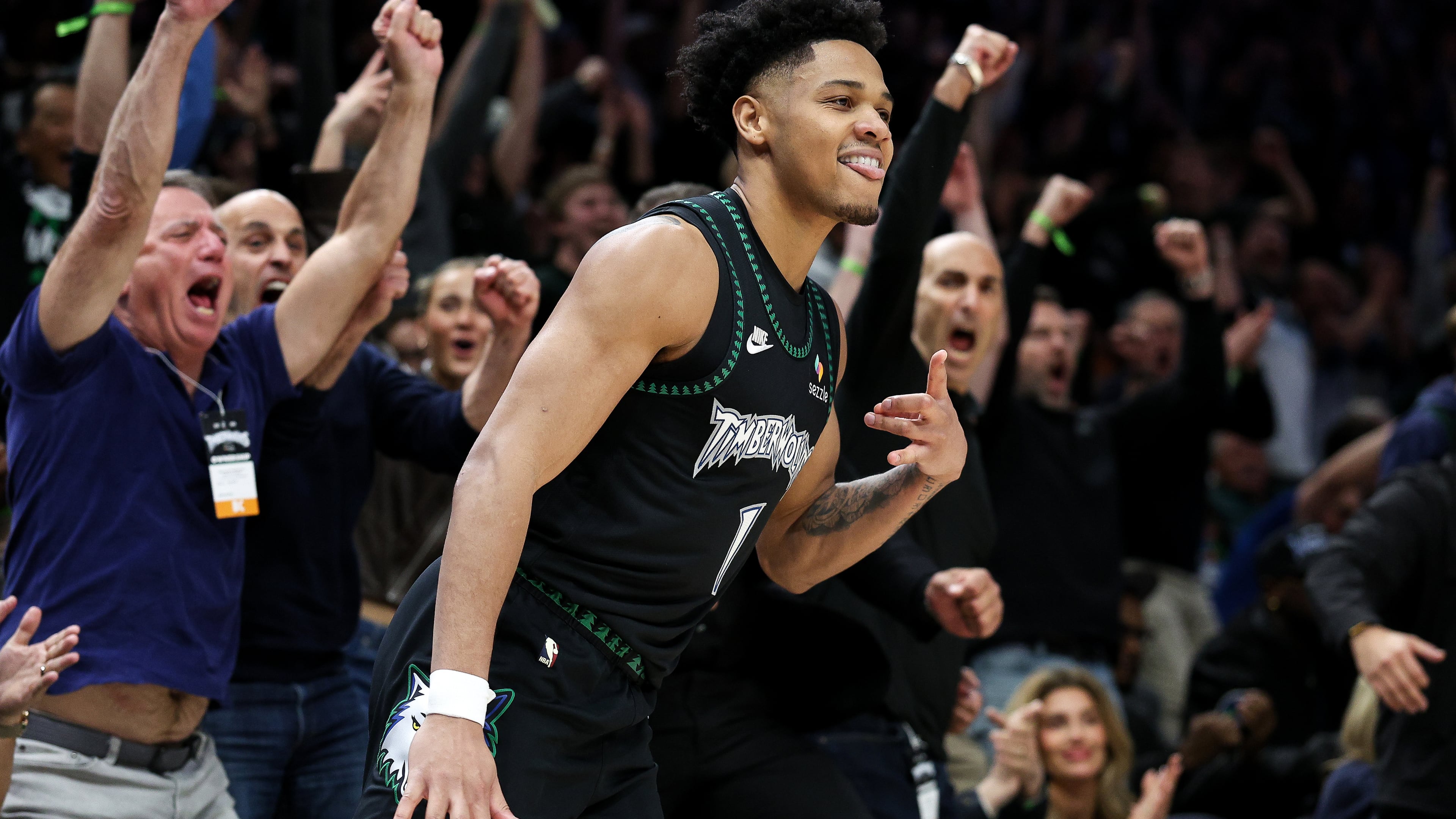 Minnesota Timberwolves guard Terrence Shannon Jr. (1) celebrates his three-point basket against the Denver Nuggets during the second half of Game 6 of a first-round NBA basketball playoffs series, Thursday, April 30, 2026, in Minneapolis. (AP Photo/Matt Krohn)