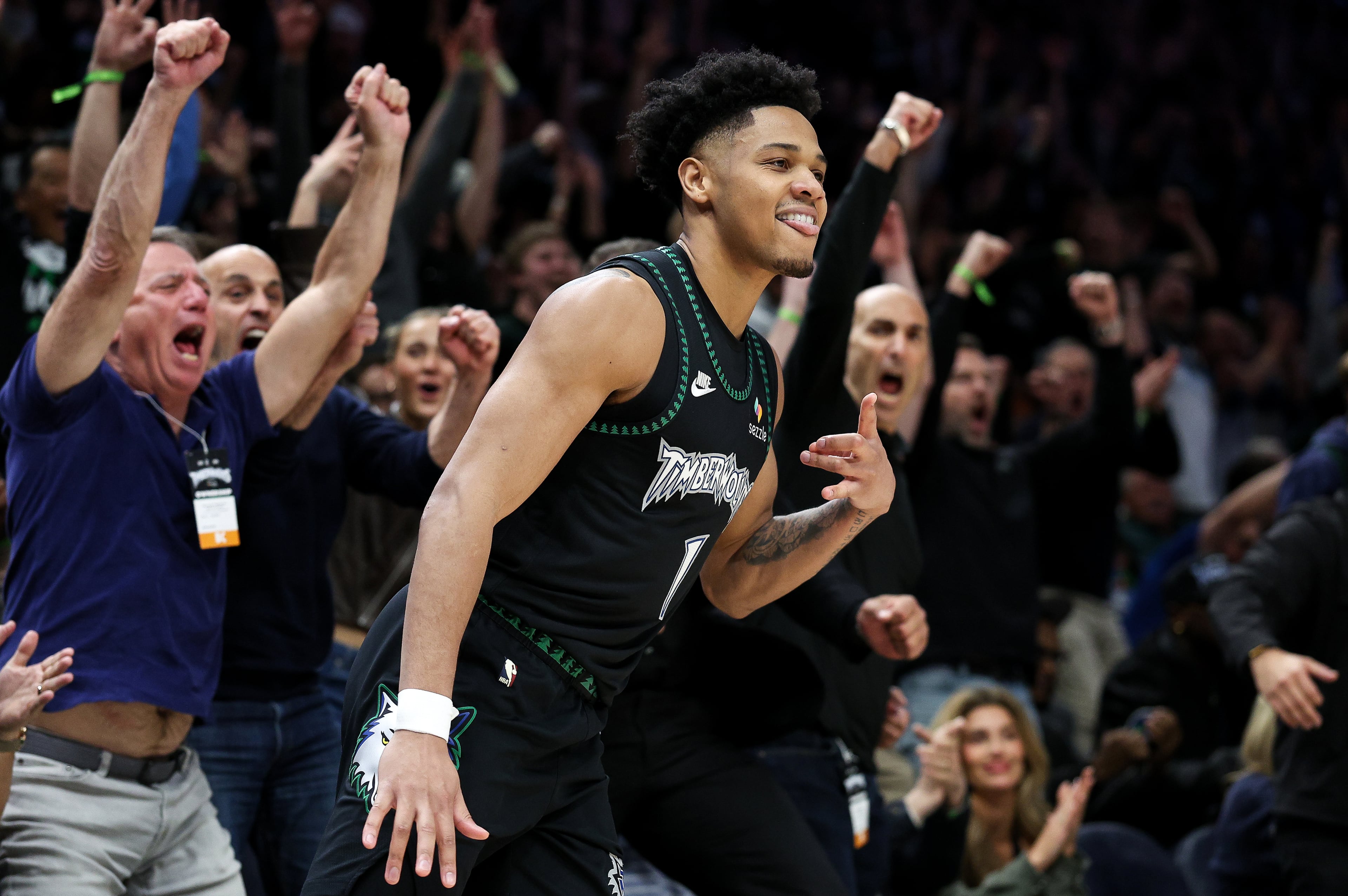 APTOPIX Nuggets Timberwolves Basketball