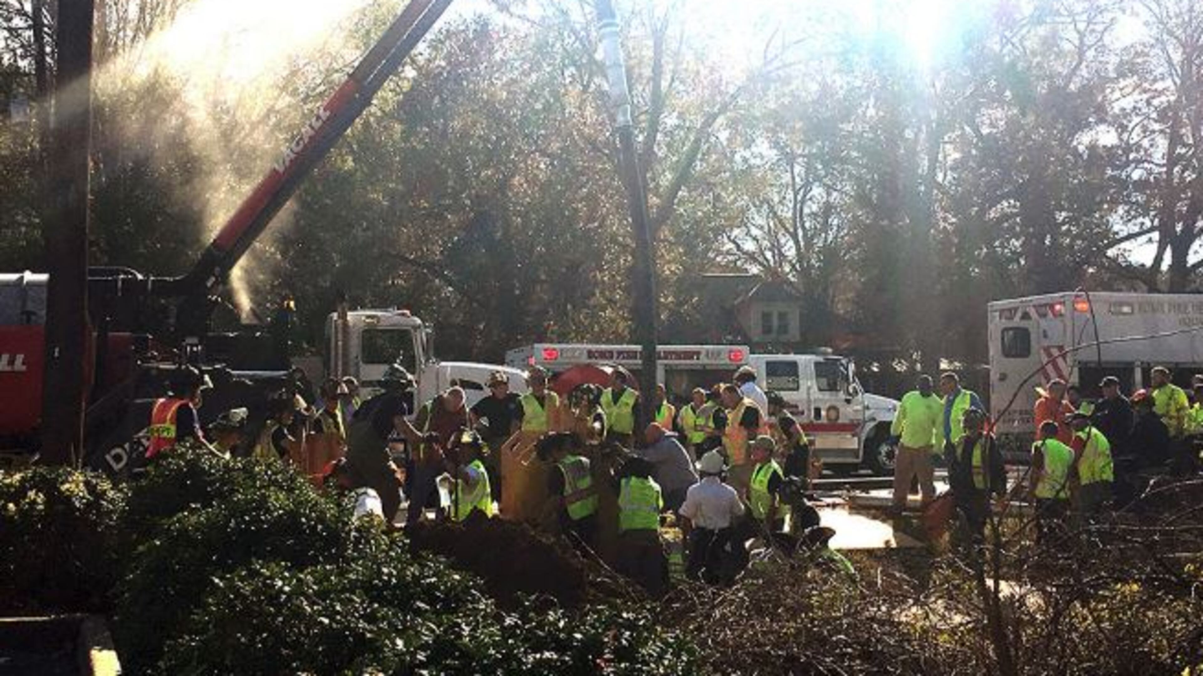 Crews worked Tuesday to free a Floyd County utility worker from a trench.