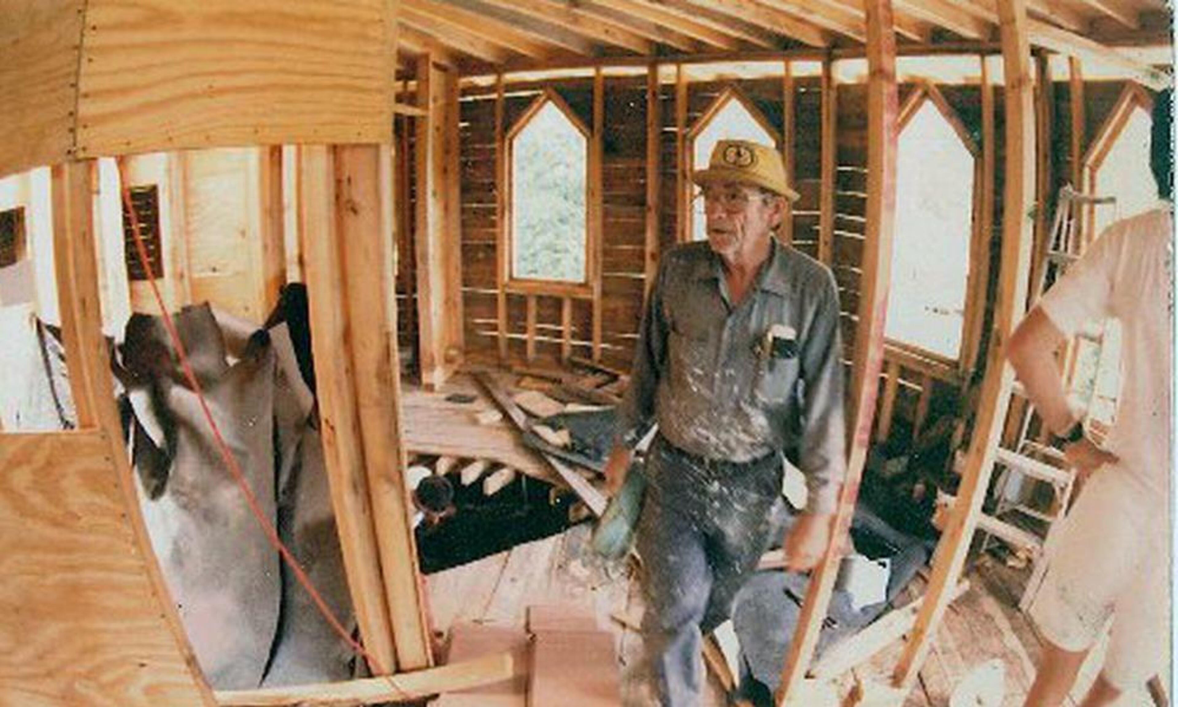 Howard Finster during early construction of the World Folk Art Church. Finster built the church with no blue prints or construction experience. Courtesy of Paradise Garden Foundation