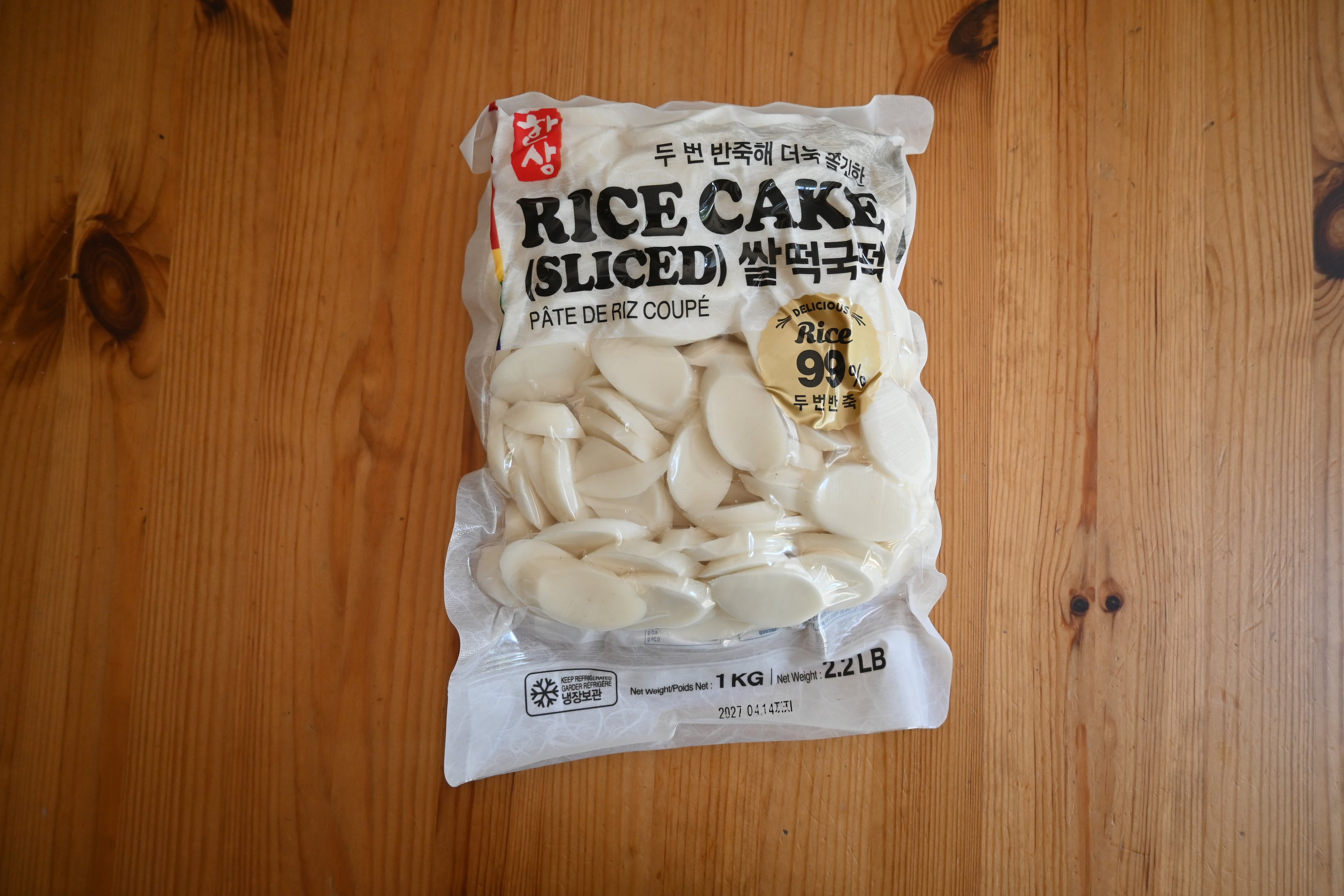 Rice cakes are sold in the refrigerated section of most Asian grocery stores. (Candy Hom for the AJC)