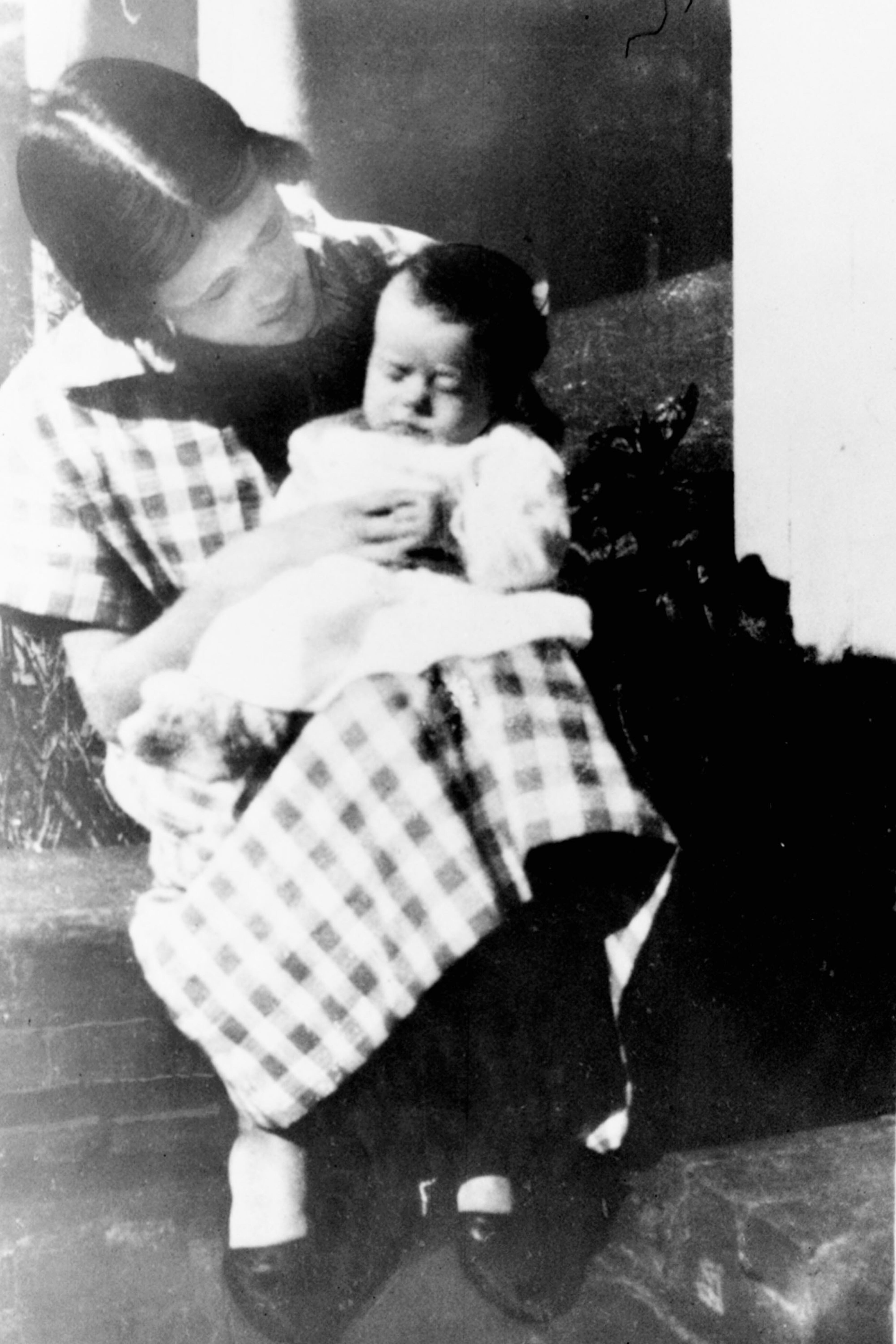 Jimmy Carter is pictured at six months old with his mother Lillian at Plains, Georgia, in March 1925. (Associated Press)