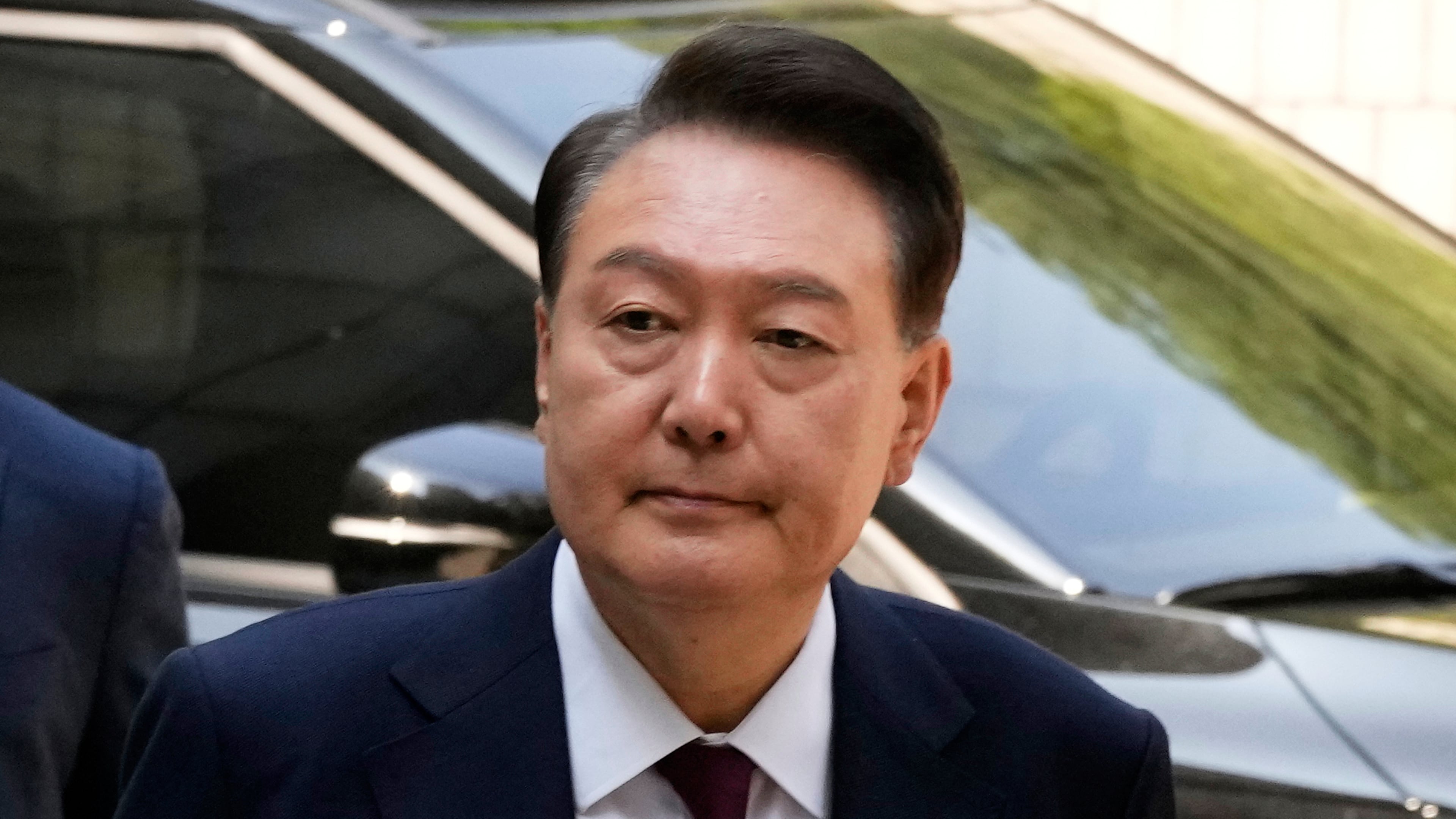 South Korea's ousted former President Yoon Suk Yeol arrives to attend his trial at the Seoul Central District Court in Seoul, South Korea, May 12, 2025. (AP Photo/Ahn Young-joon, Pool, File)