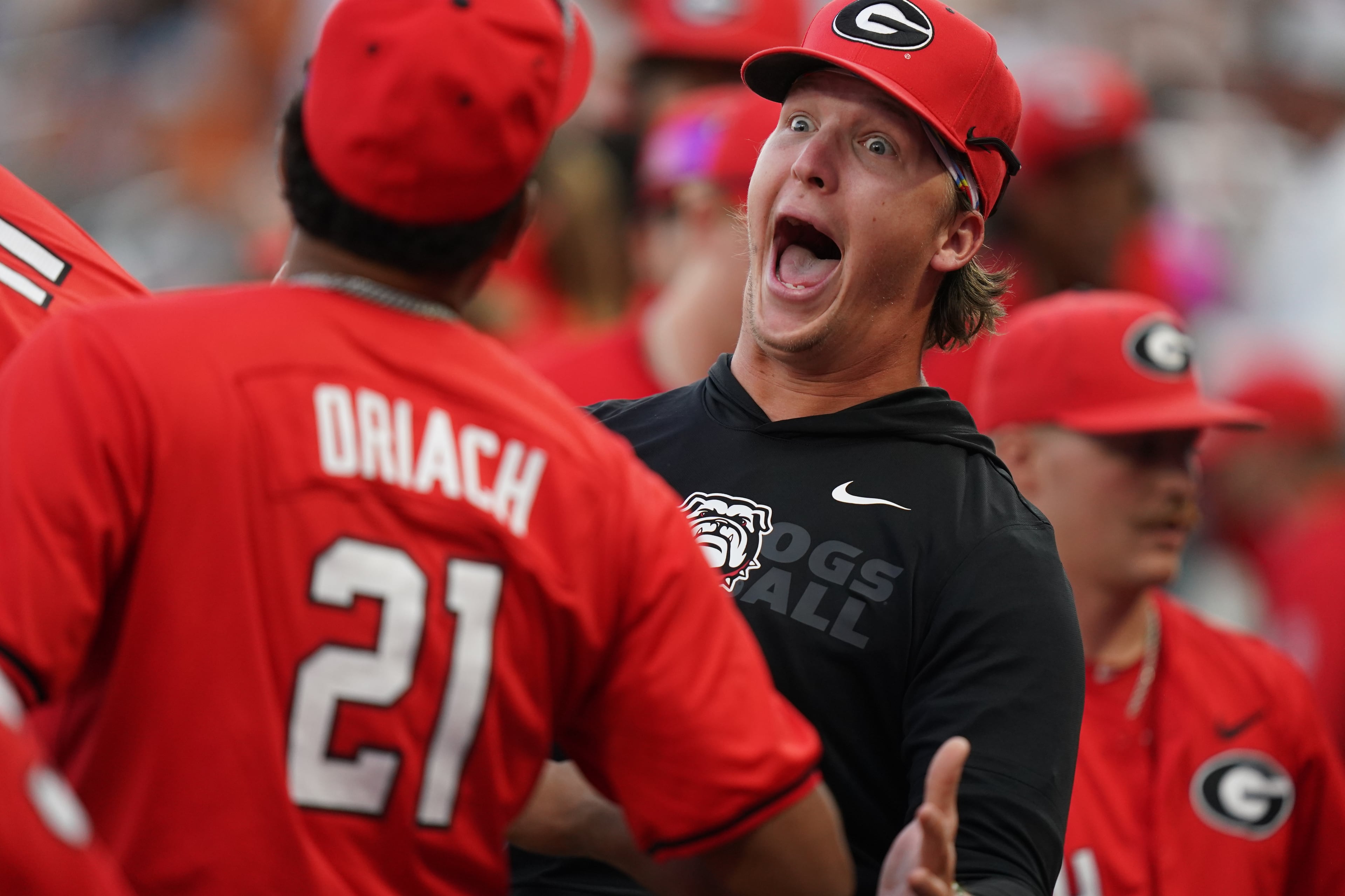 Georgia teammates react in the dugout after a run is scored in the fifth inning during an NCAA baseball College World Series elimination game against Texas, Tuesday, June 16, 2026 in Omaha, Neb. Georgia won 2-0. (AP Photo/Vera Nieuwenhuis)