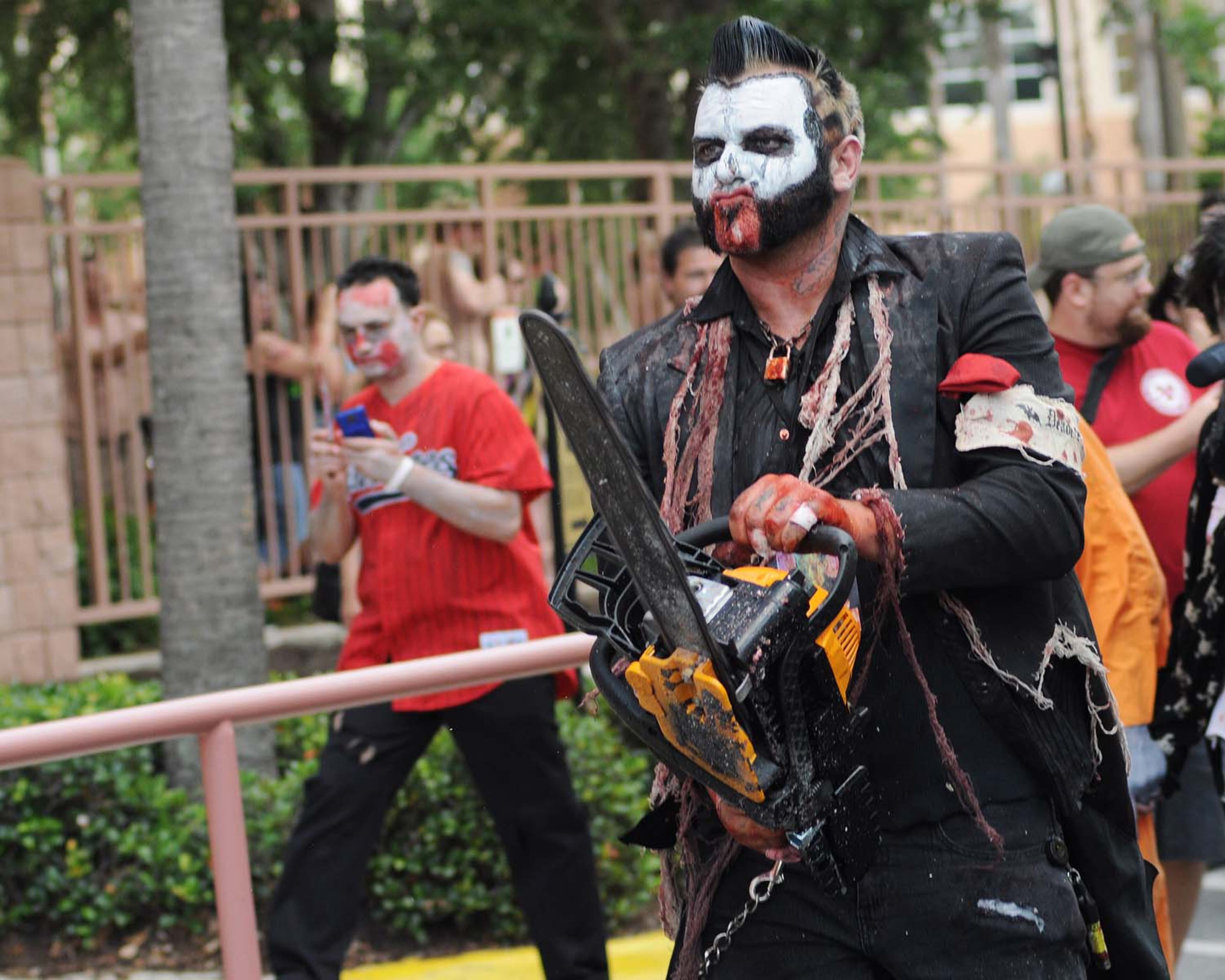 A pack of blood-thirsty zombies marched on the Rosen Centre Hotel in Orlando, Florida to kick off Spooky Empire's annual May-Hem horror convention.