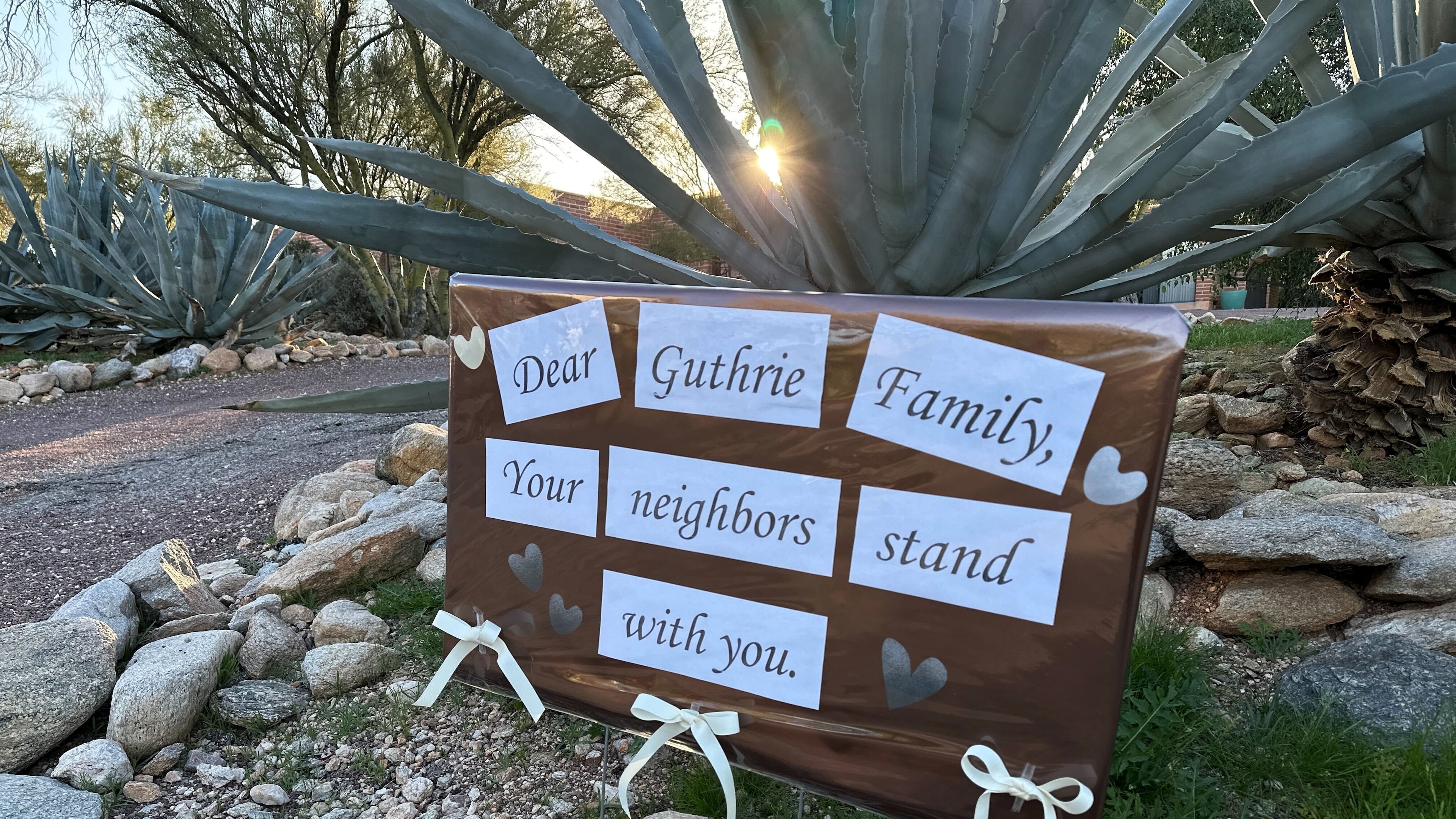 /// Neighbors of Nancy Guthrie, the daughter of "Today" host Savannah Guthrie, show support for the family in metro Tucson, Ariz., on Tuesday, Feb. 3, 2026, as the search continues to find Nancy who was reported missing. (AP Photo/Sejal Govindarao)