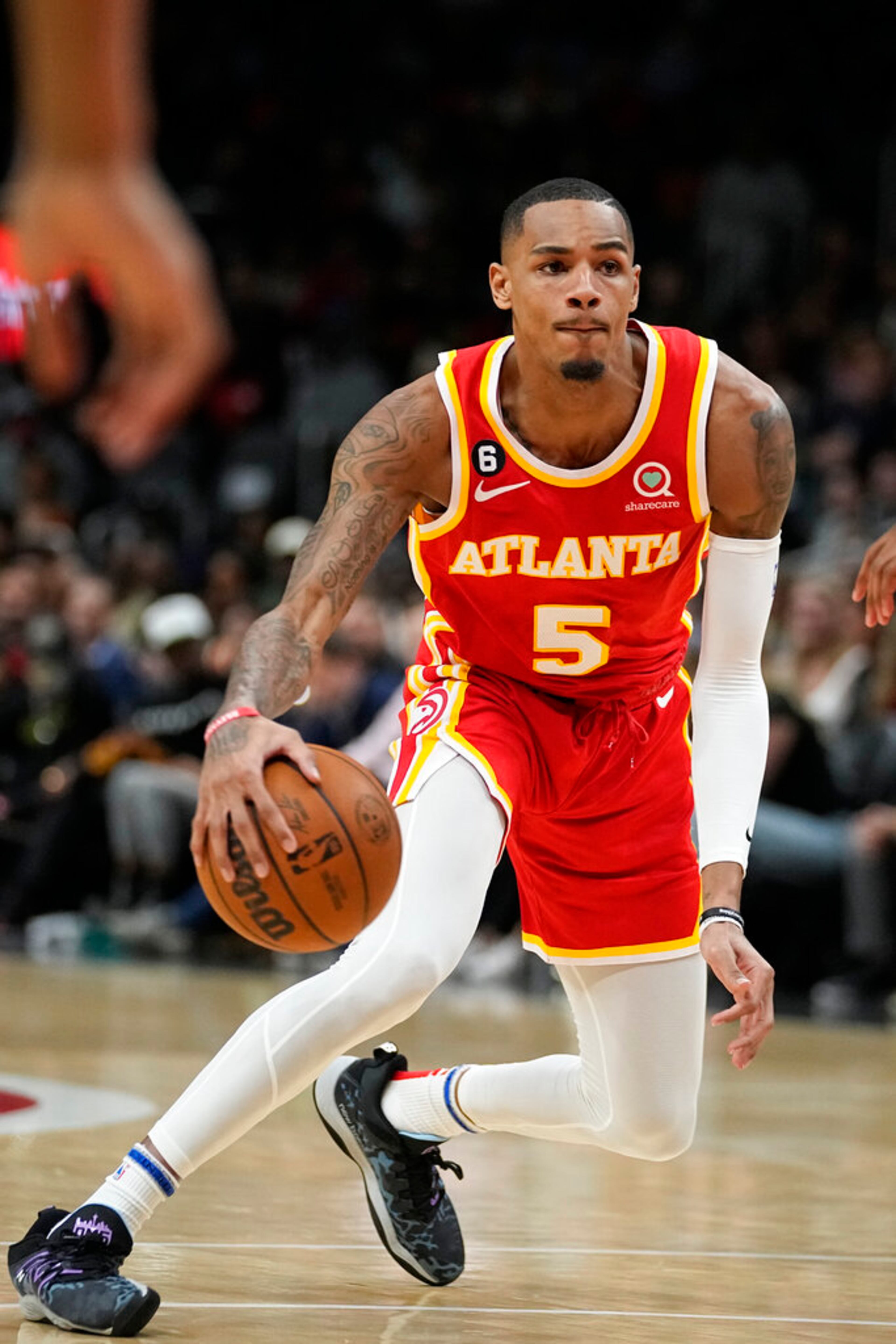 Atlanta Hawks guard Dejounte Murray (5) is shown in action against the Portland Trail Blazers during the first half of an NBA basketball game Friday, March 3, 2023, in Atlanta. (AP Photo/John Bazemore)