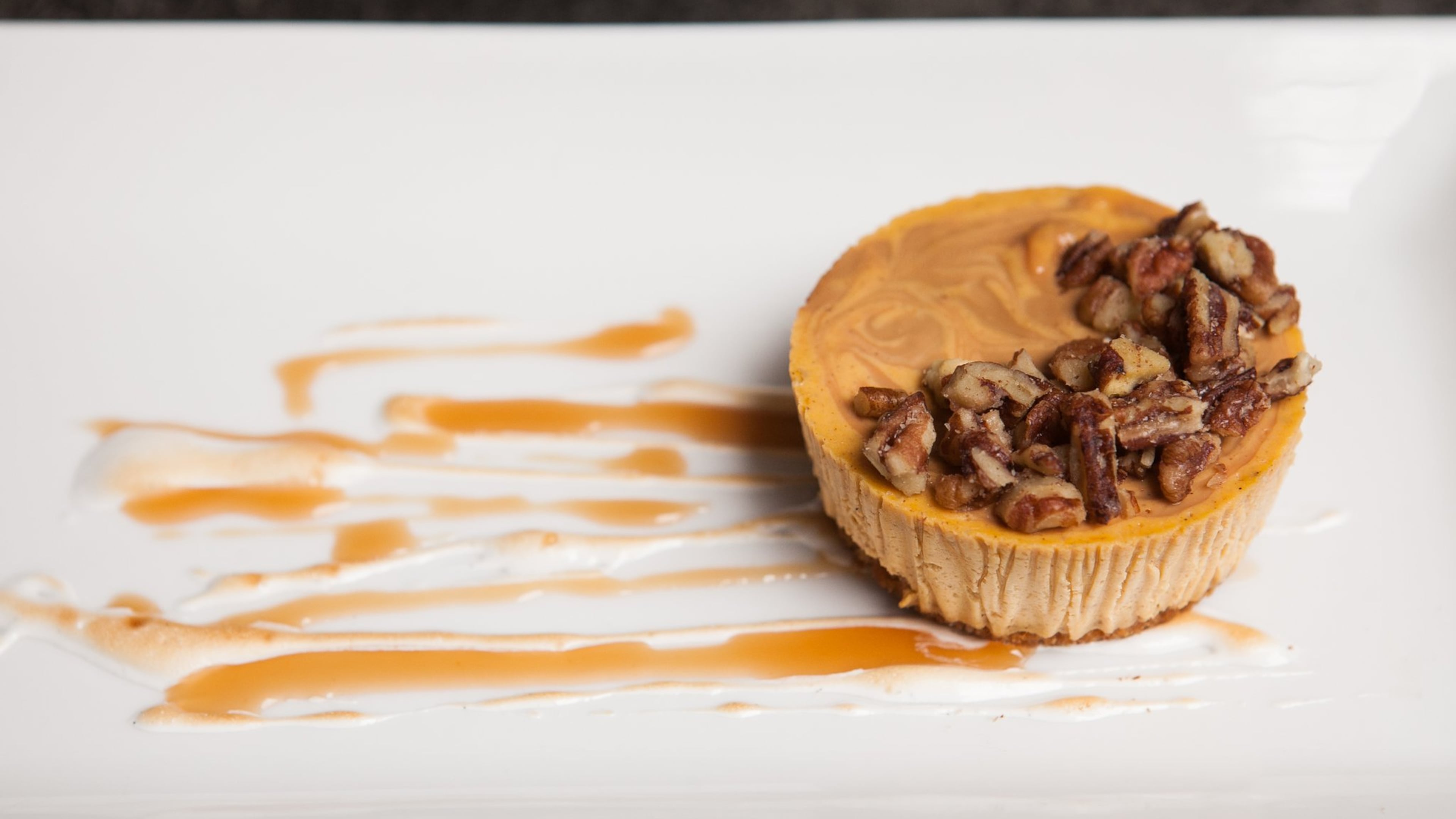 Dulce de Leche Swirled Pumpkin Cheesecake (styling by Chef Rebecca Weil) (Photography by Renee Brock/Special)