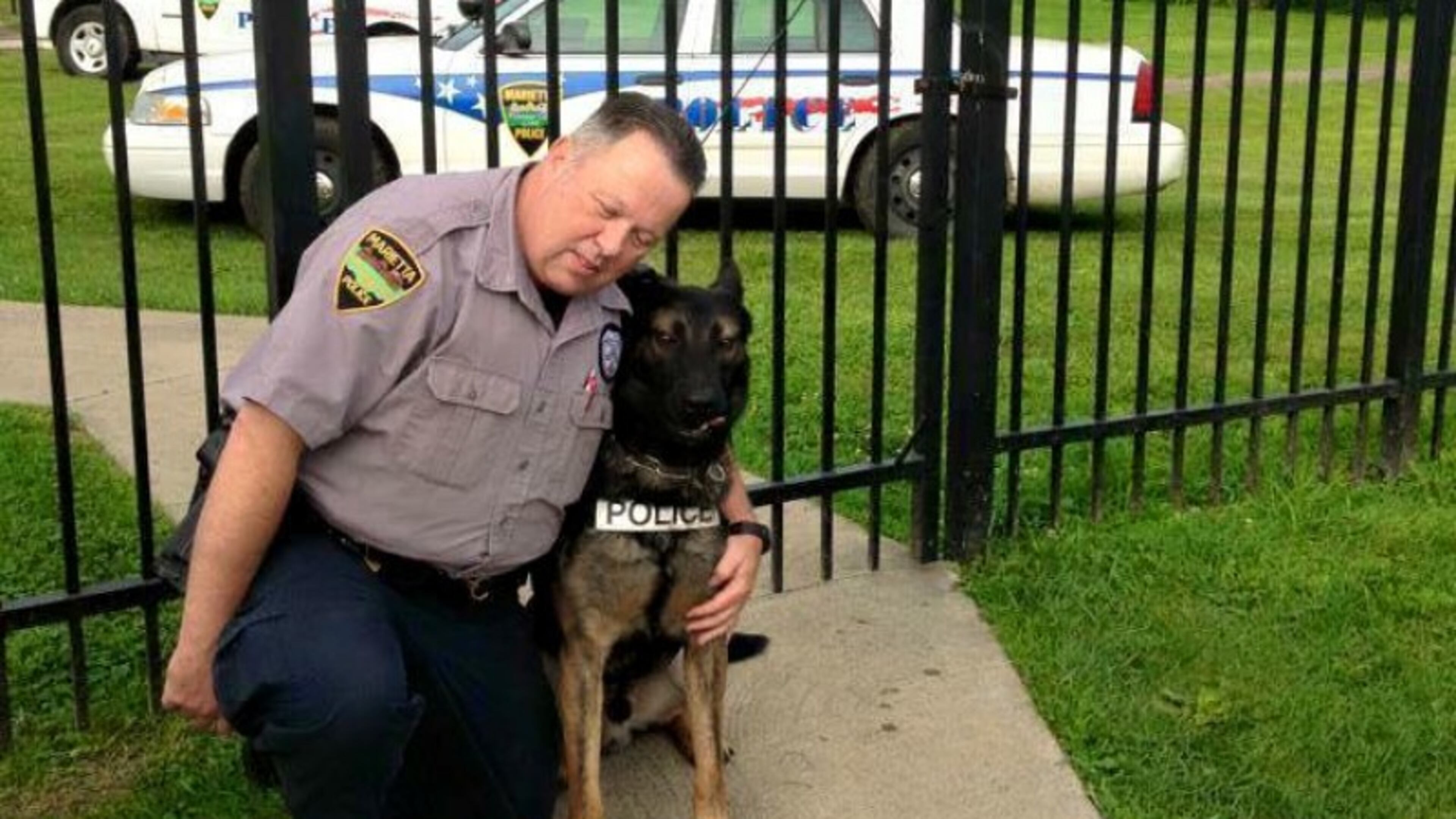 Retired Marietta police Officer Matt Hickey and his longtime partner Ajax. (Contributed)