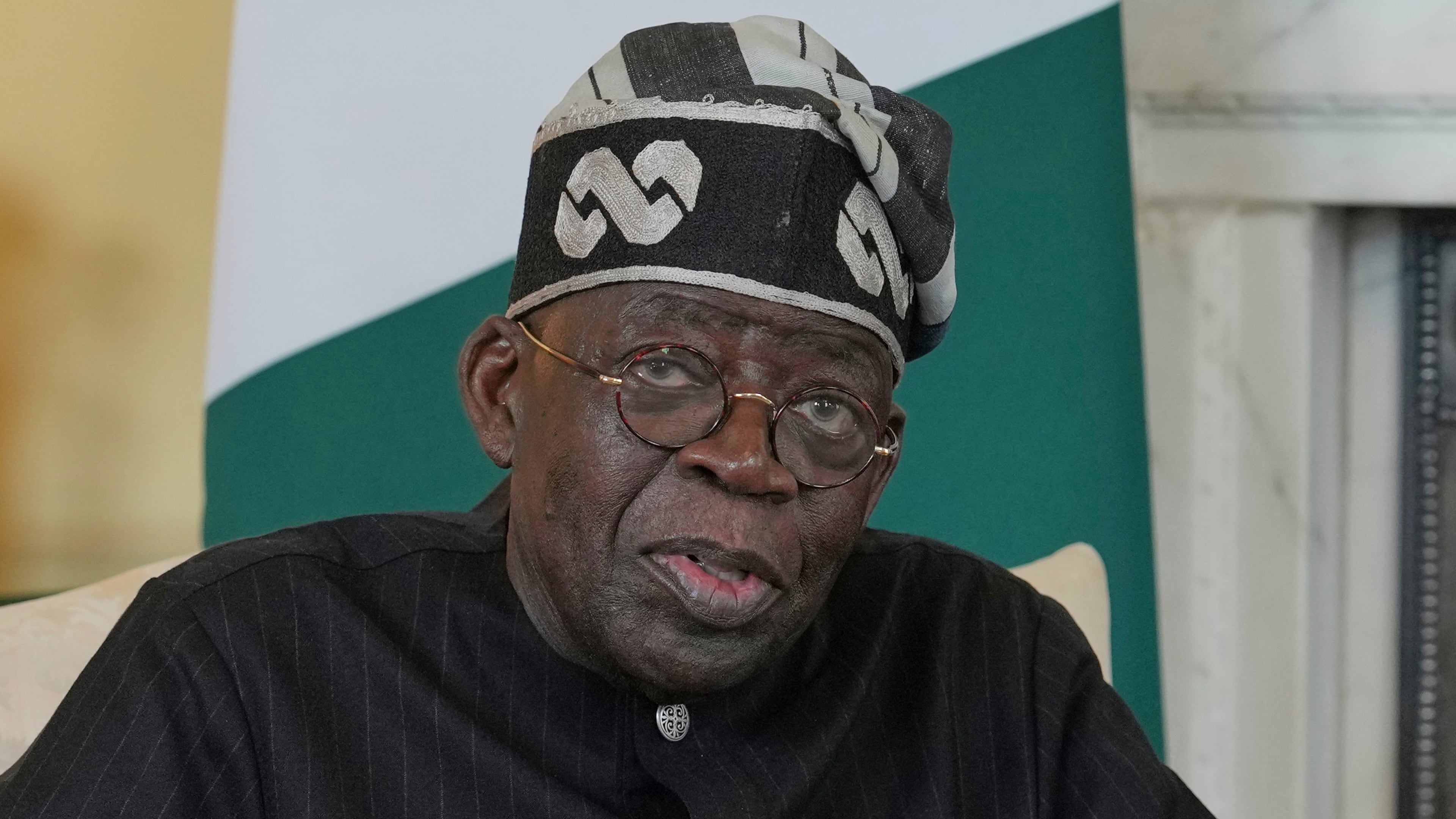 FILE -Nigerian President Bola Tinubu speaks to the media ahead of his meeting with Britain's Prime Minister Keir Starmer inside 10 Downing Street in London, Thursday, March 19, 2026. (AP Photo/Kin Cheung, Pool, File)