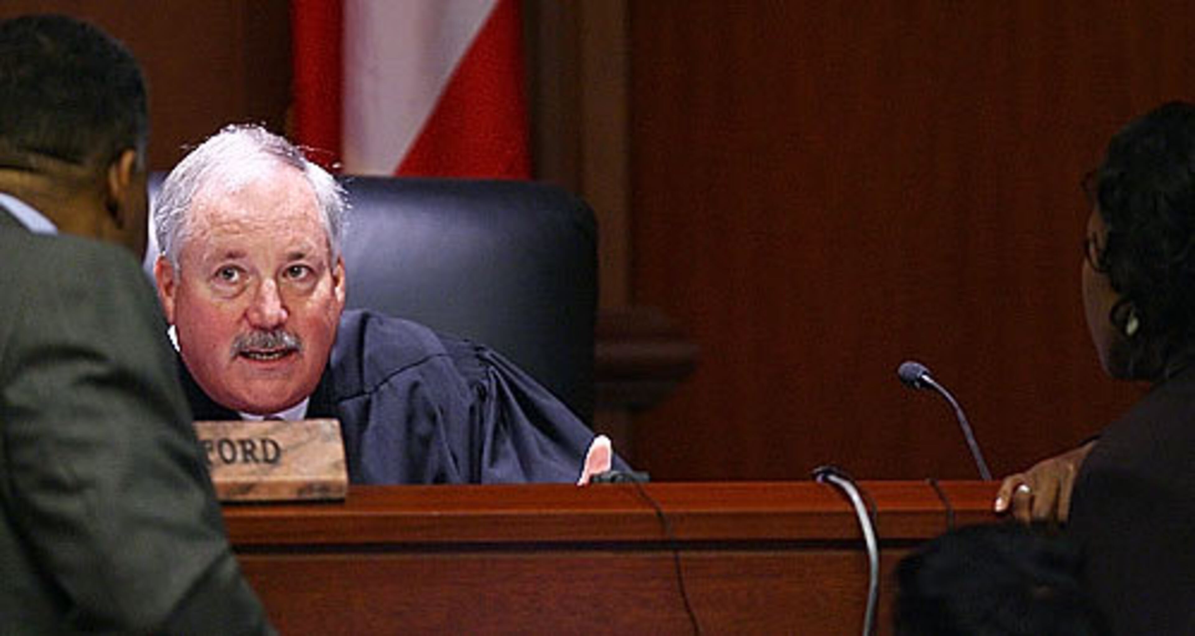 Judge James Bodiford talks with attorneys during Friday's proceeding.