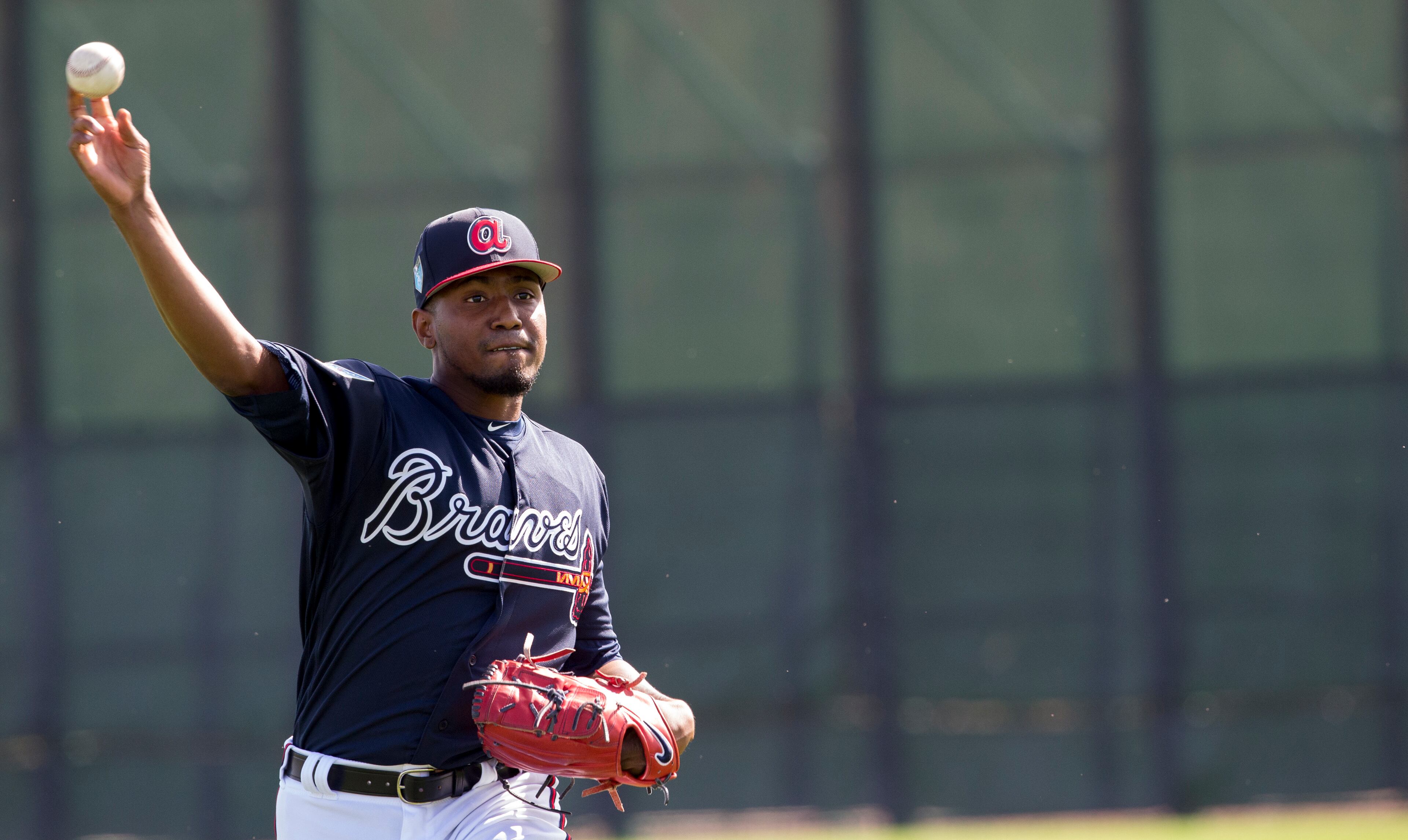Atlanta Braves pitcher Julio Teherán warms up with the other pitchers during baseball spring training camp in Kissimmee, Fla., Wednesday, Feb. 14, 2018. (AP Photo/Willie J. Allen Jr.)