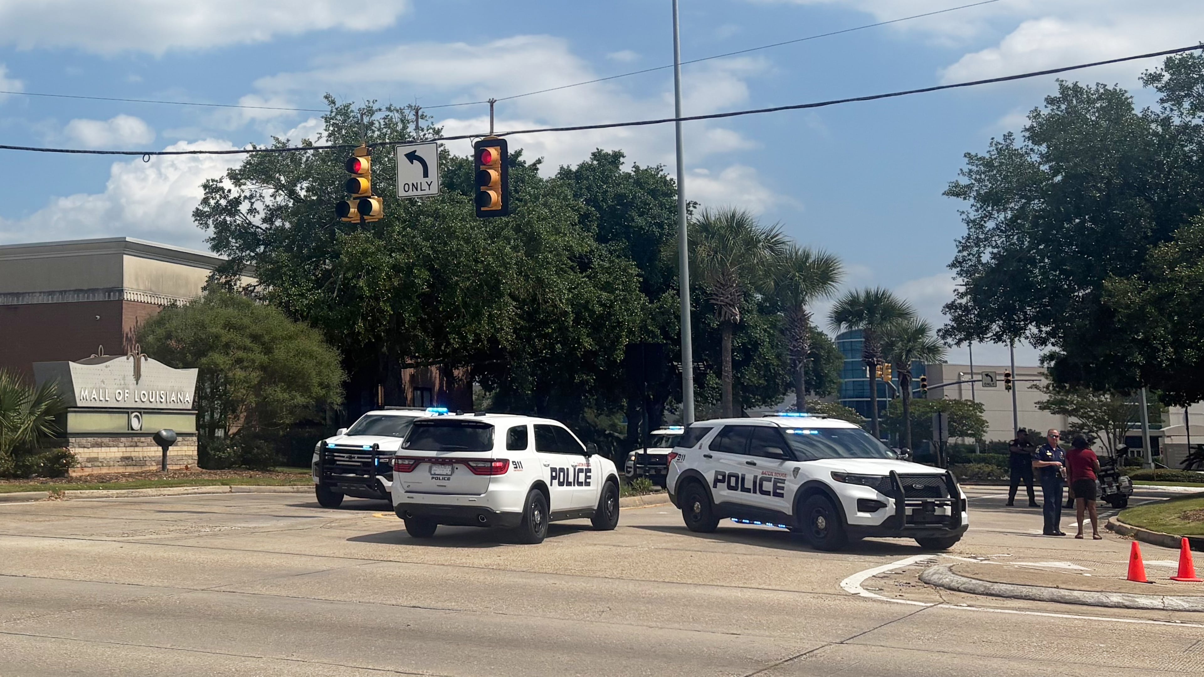 Law enforcement personnel respond to reports of a shooting at Mall of Louisiana in Baton Rouge, La., Thursday, April 23, 2026. (AP Photo/Sara Cline)