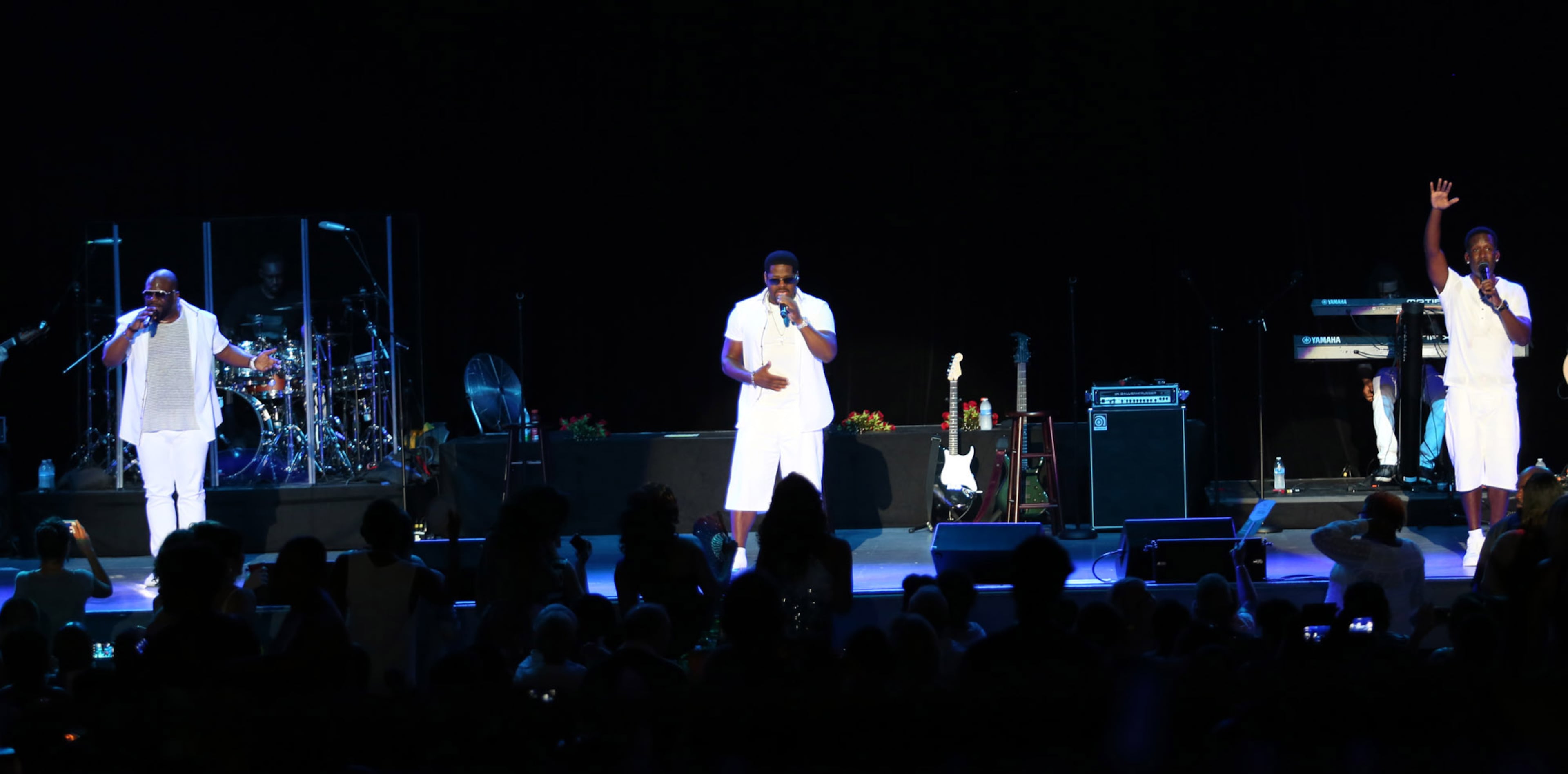 Boyz II Men thrill the full house at Chastain Park Amphitheatre performing their greatest hits. The group was discovered by New Edition's Michael Bivins, who went on to produce their first album, "Cooleyhighharmony," released in 1991. Their style was dubbed "hip hop doo woo," and defined the "New Jack Swing sound.