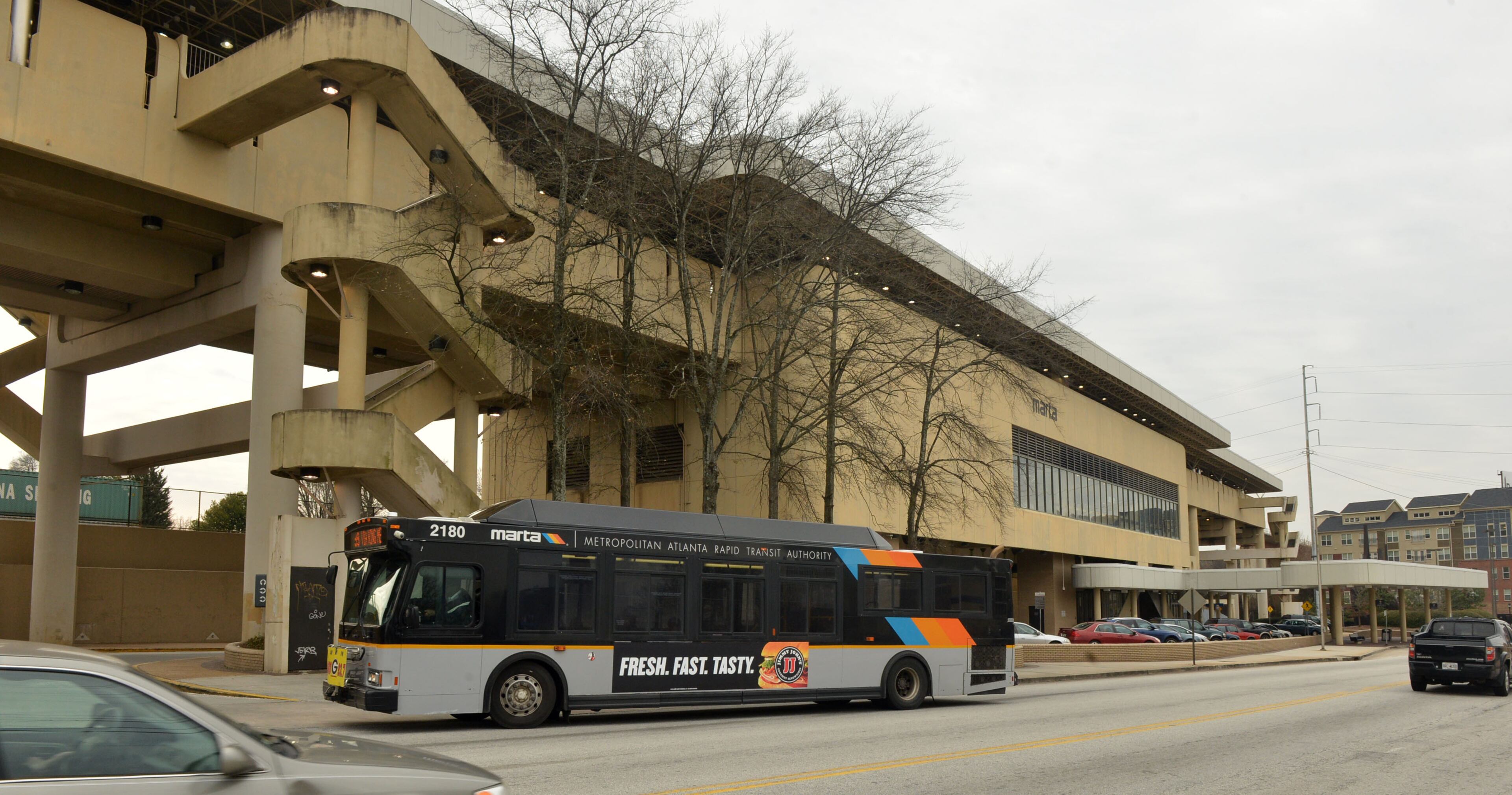 FEBRUARY 6, 2014 ATLANTA The area around the King Memorial MARTA station is shown Thursday, February 6, 2014. MARTA is gearing up to take a big step in its plan to entice more riders by allowing developers to build apartment and shopping destinations on underused parking lots at its rail stations. Along the lines of Lindbergh Center Station and One Atlantic Center, MARTA wants to launch five additional "transit-oriented development" projects in the next two years. Next on the drawing board is a development at King Memorial Station, which the MARTA Board will be briefed about on Thursday afternoon. If all goes as planned, Walton Communities would be issued a 99-year lease to take over a four-acre parking lot near King Memorial Station and build about 380 apartments there, along with some ground-floor retail space. A second transit-oriented development is in the pipeline for Avondale Station. Several more projects are expected to be announced later this year. KENT D JOHNSON/KDJOHNSON@AJC.COM