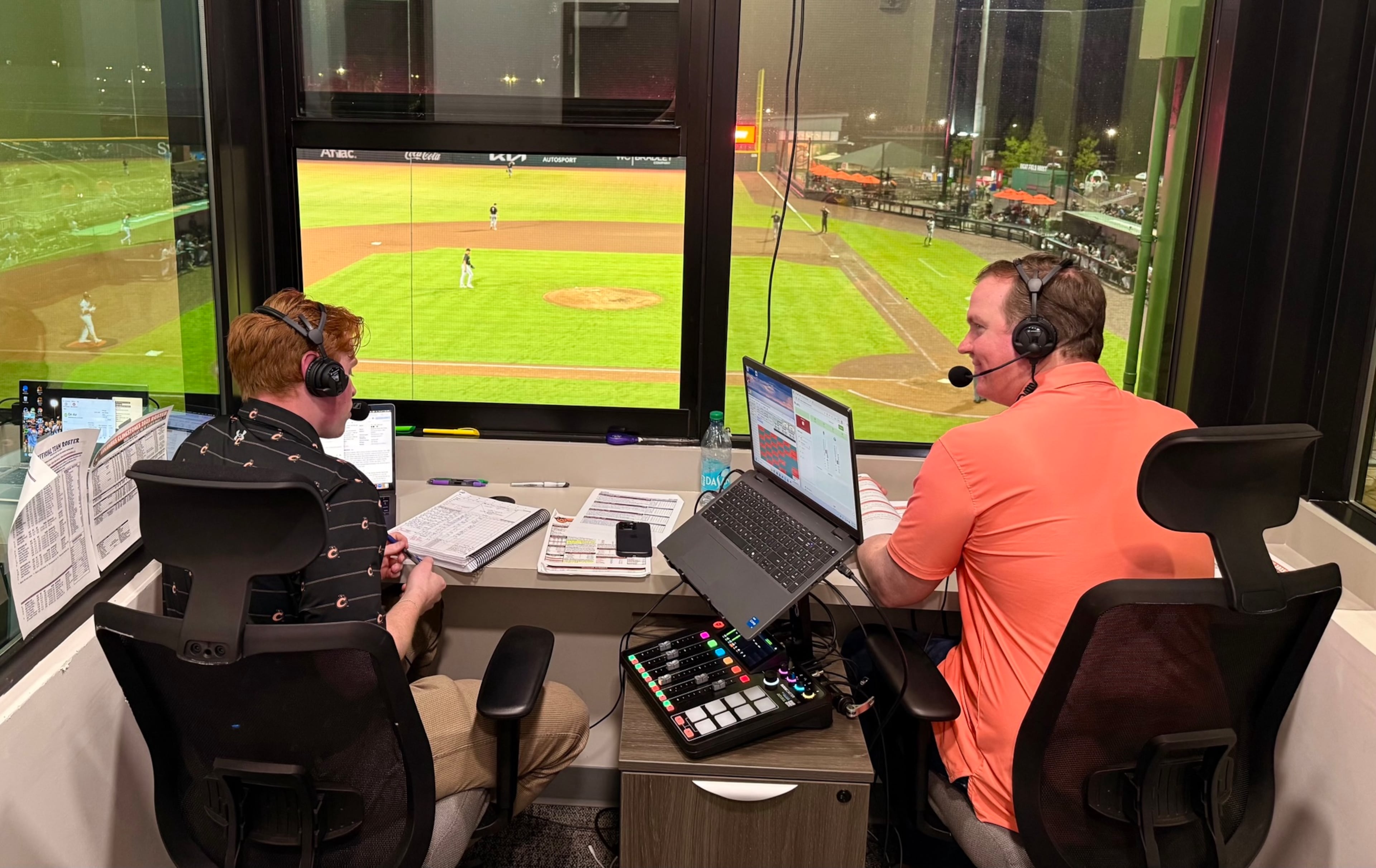 U.S. Rep. Brian Jack delivers color commentary at a Columbus Clingstones game in 2025. (AJC/Greg Bluestein)