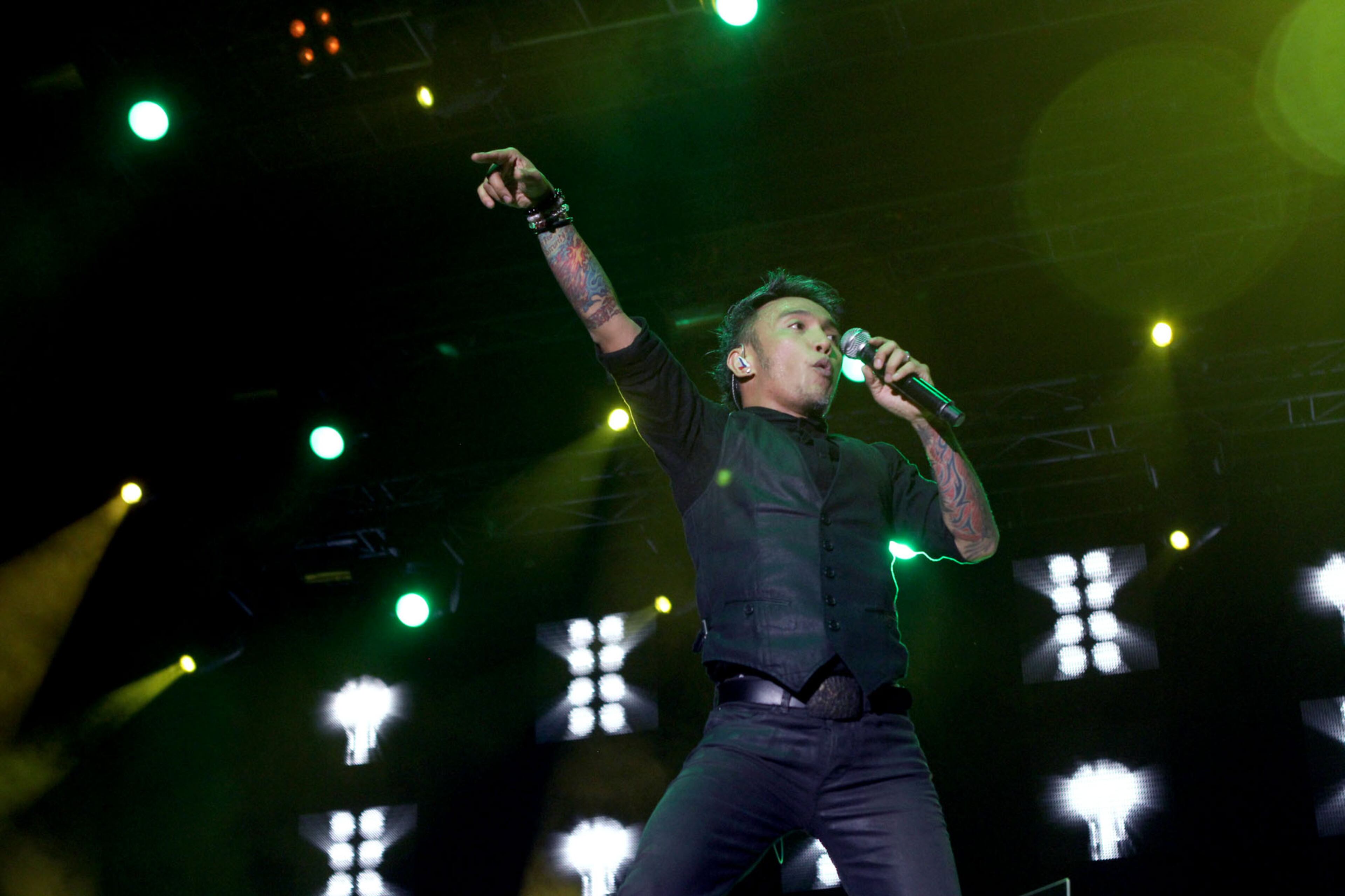 Arnel Pineda lead vocalist for classic rock band Journey, singing hits such as "Seprate Ways," "Any Way You Want It," and "Chain Reaction," they close out the first night of Music Midtown on Friday.
