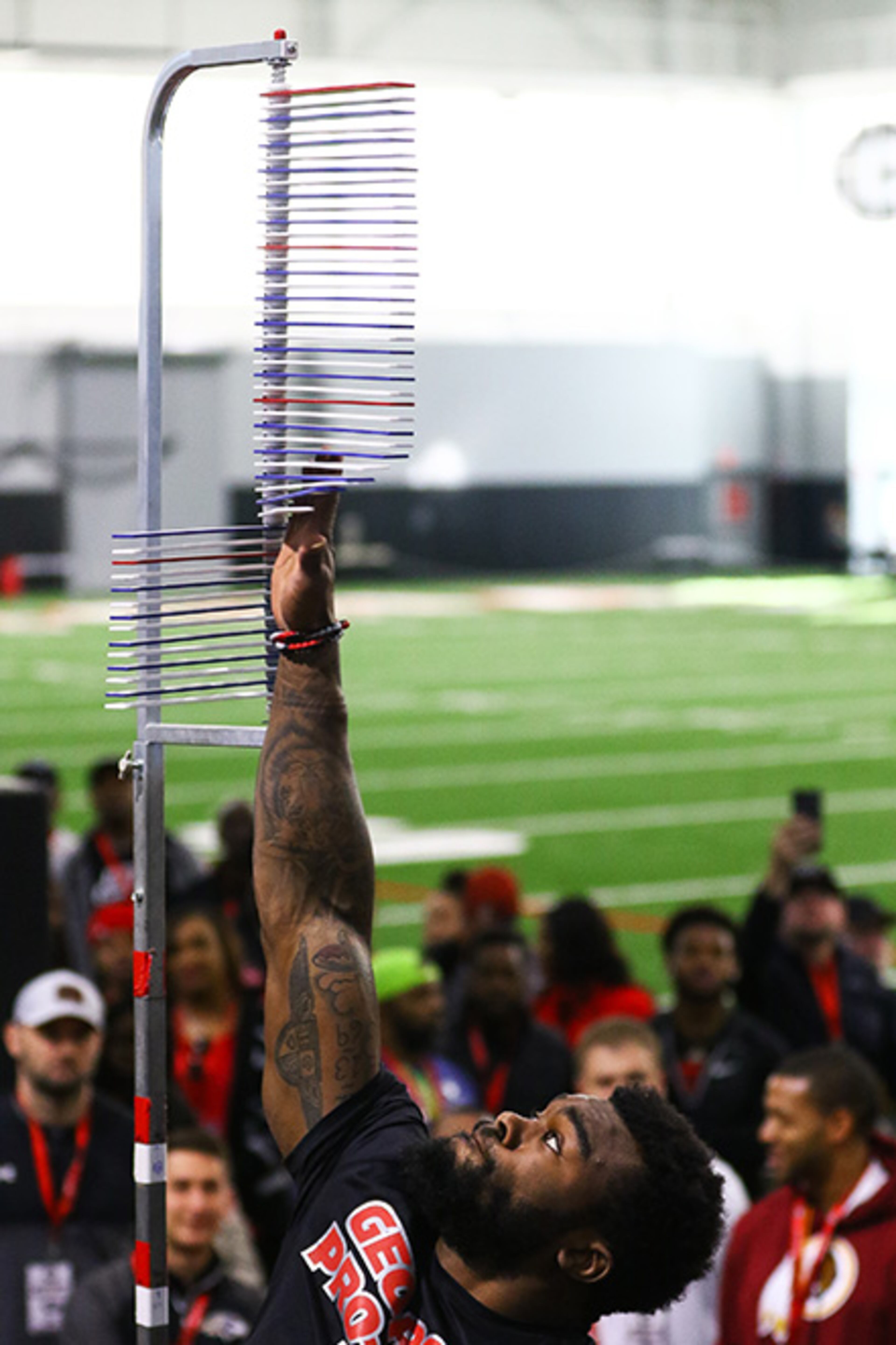 Georgia running back Elijah Holyfield (13) takes part in the vertical leap during Georgia's Pro Day Wednesday, March 20, 2019, in Athens.