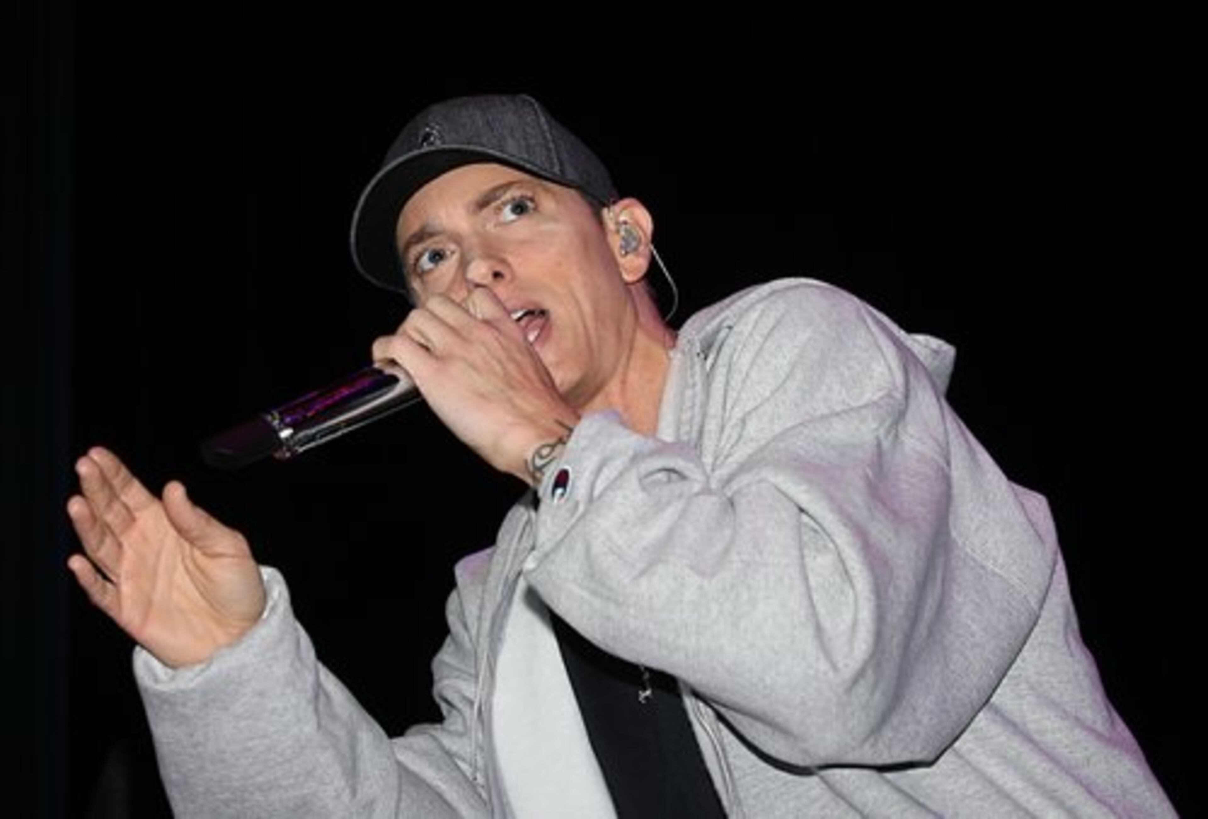 Eminem treated hundreds of hometown fans in Detroit to a free show.