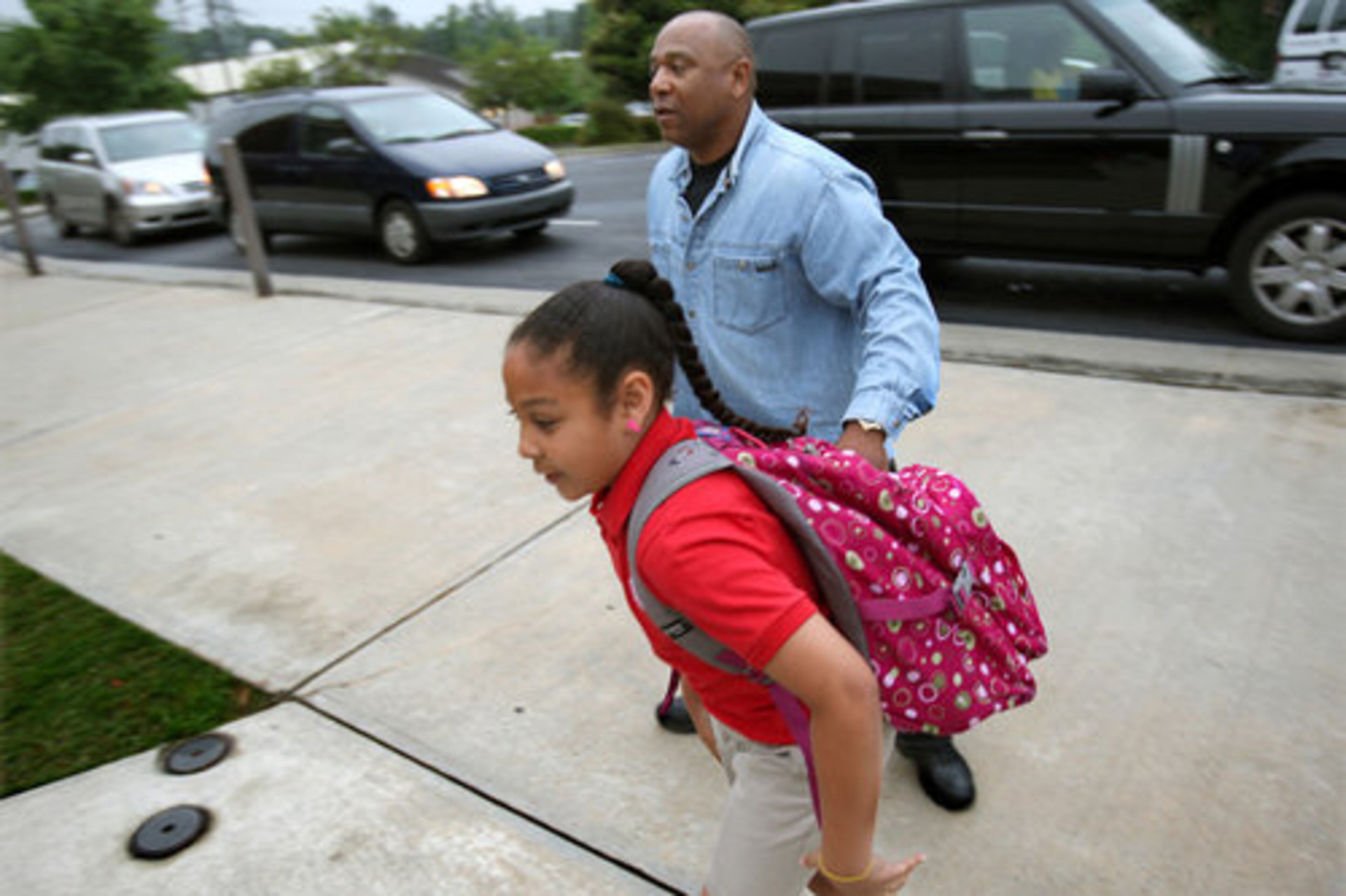 Braves hitting coach Terry Pendleton was his daughter, Trinity, up to the school entrance.