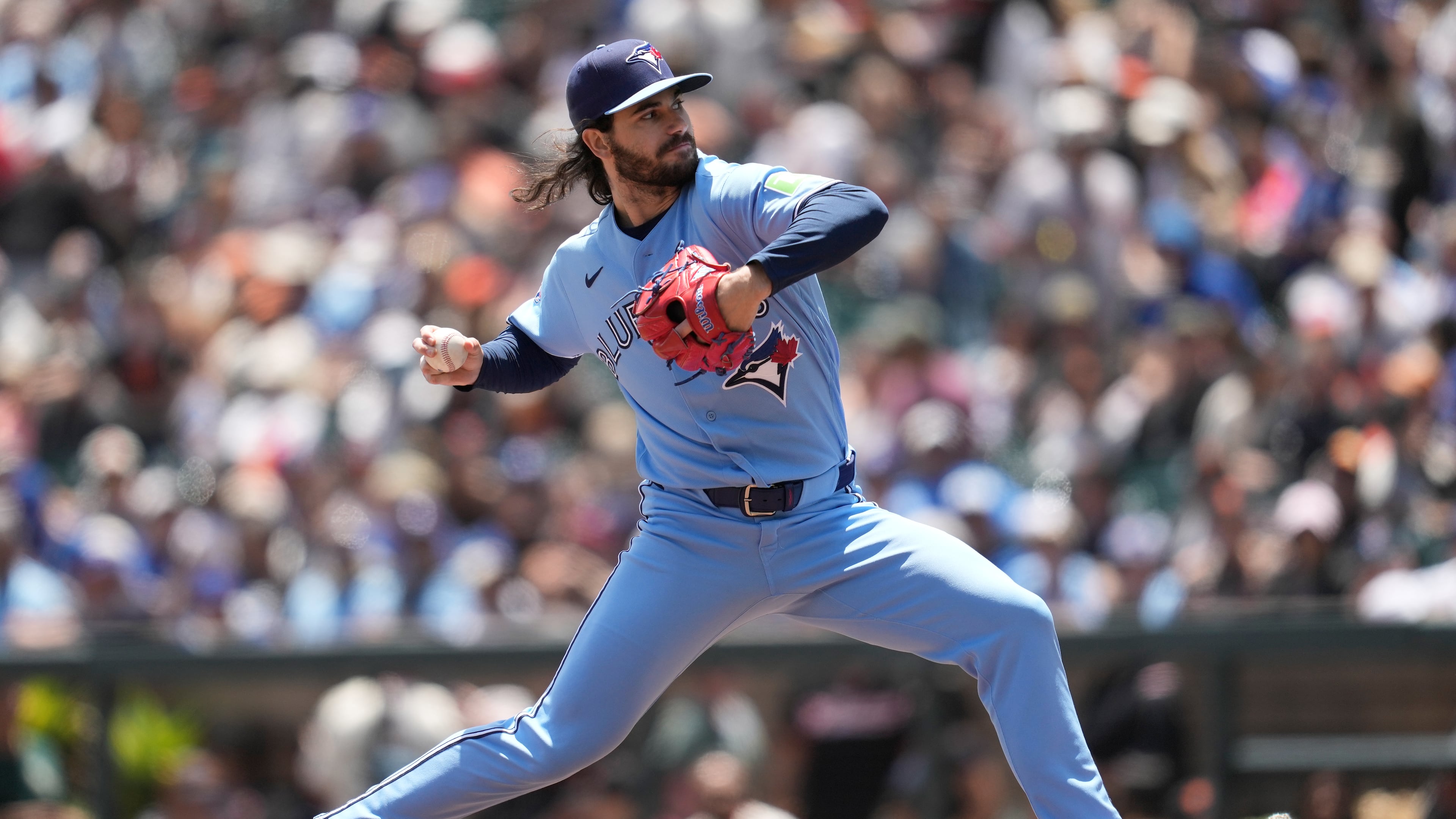 Toronto Blue Jays pitcher Dylan Cease throws against the San Francisco Giants during the first inning of a baseball game Wednesday, July 8, 2026, in San Francisco. (AP Photo/Jeff Chiu)