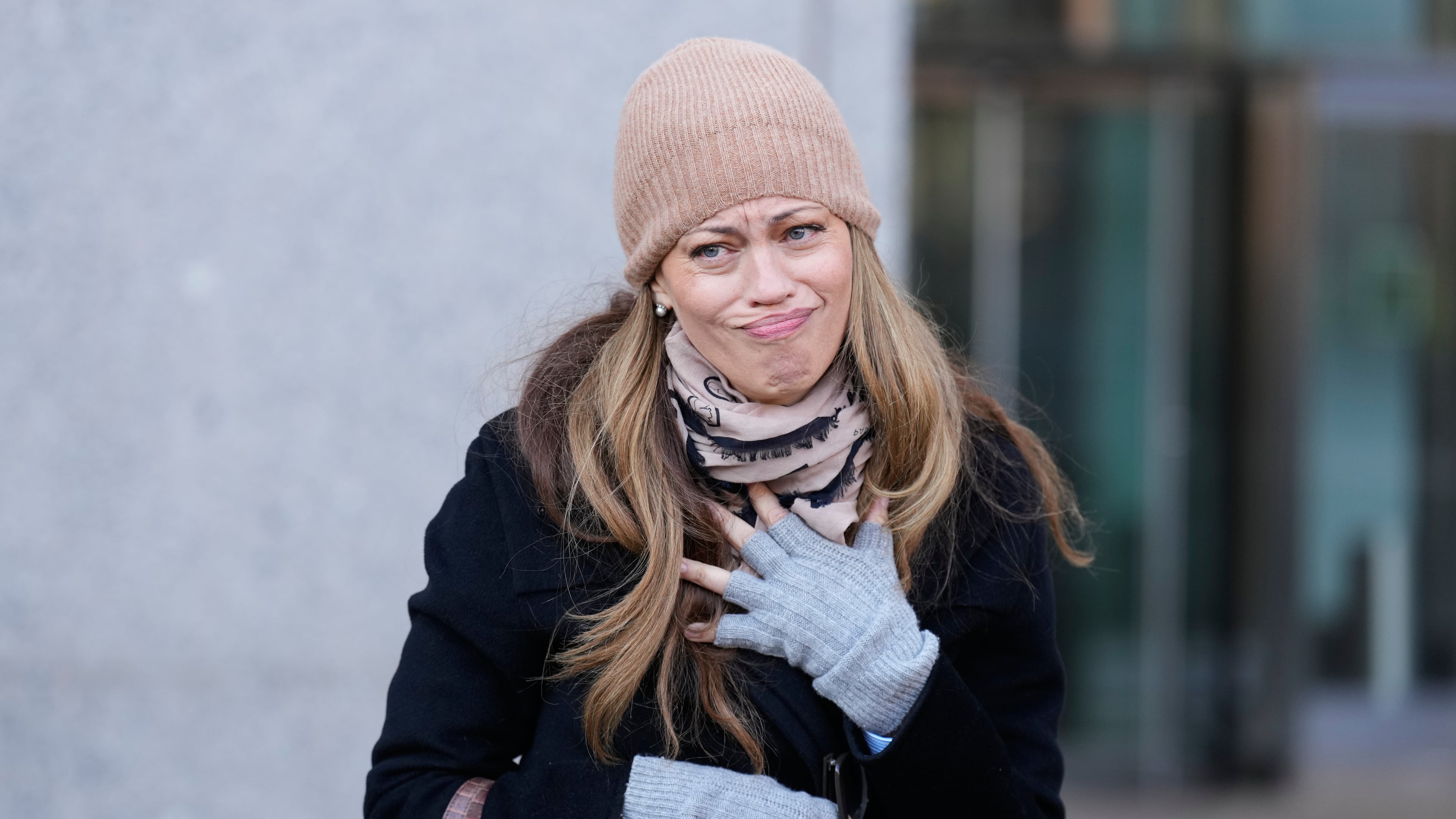 Drew Dixon talks to a fan before entering the courthouse in New York, Monday, Jan. 12, 2026. (AP Photo/Seth Wenig)