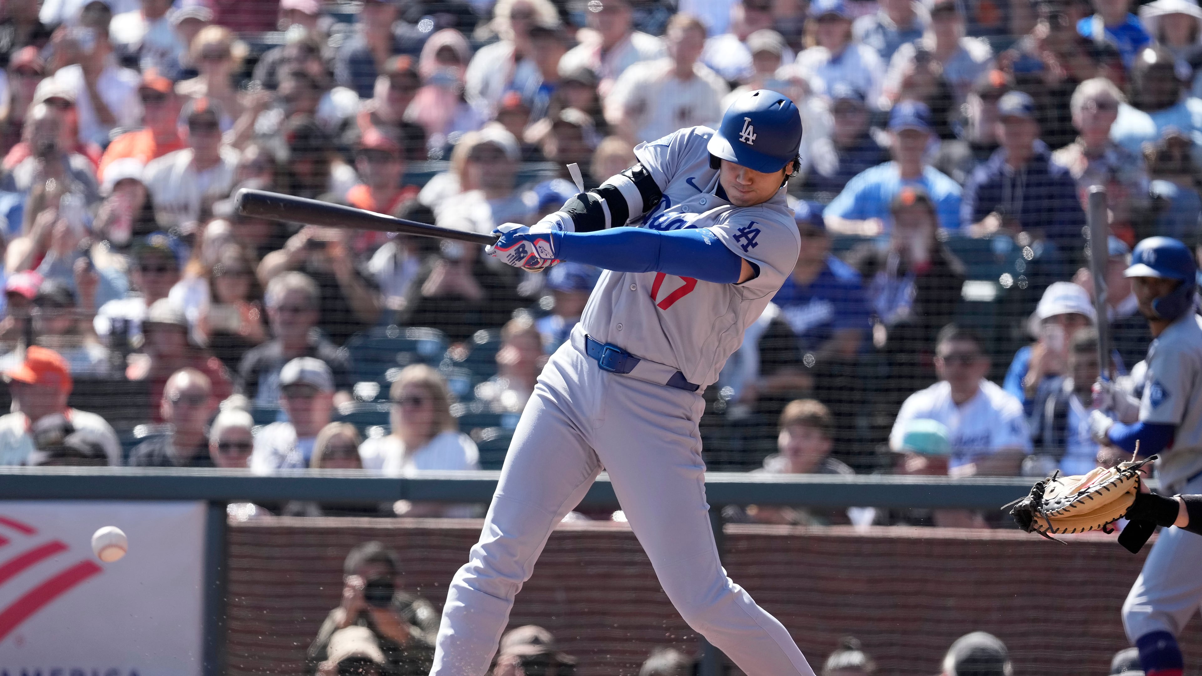 Los Angeles Dodgers' Shohei Ohtani hits a single against the San Francisco Giants during the third inning of a baseball game Sunday, Sept. 27, 2026, in San Francisco. (AP Photo/Tony Avelar)