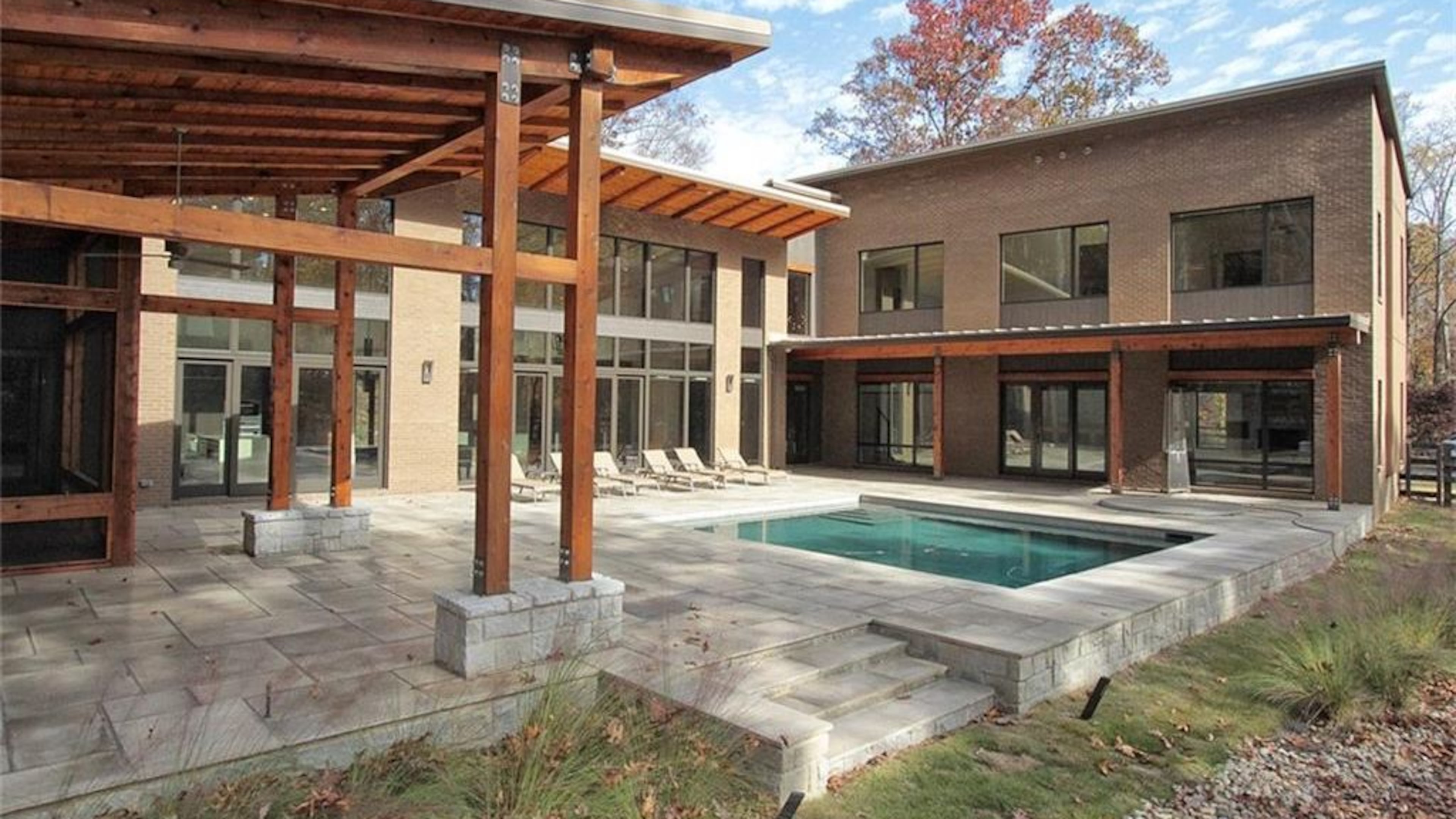 This modern estate at 4056 Hog Mountain Road in Hoschton is listed for $2.195 million. (Photos via zillow.com)