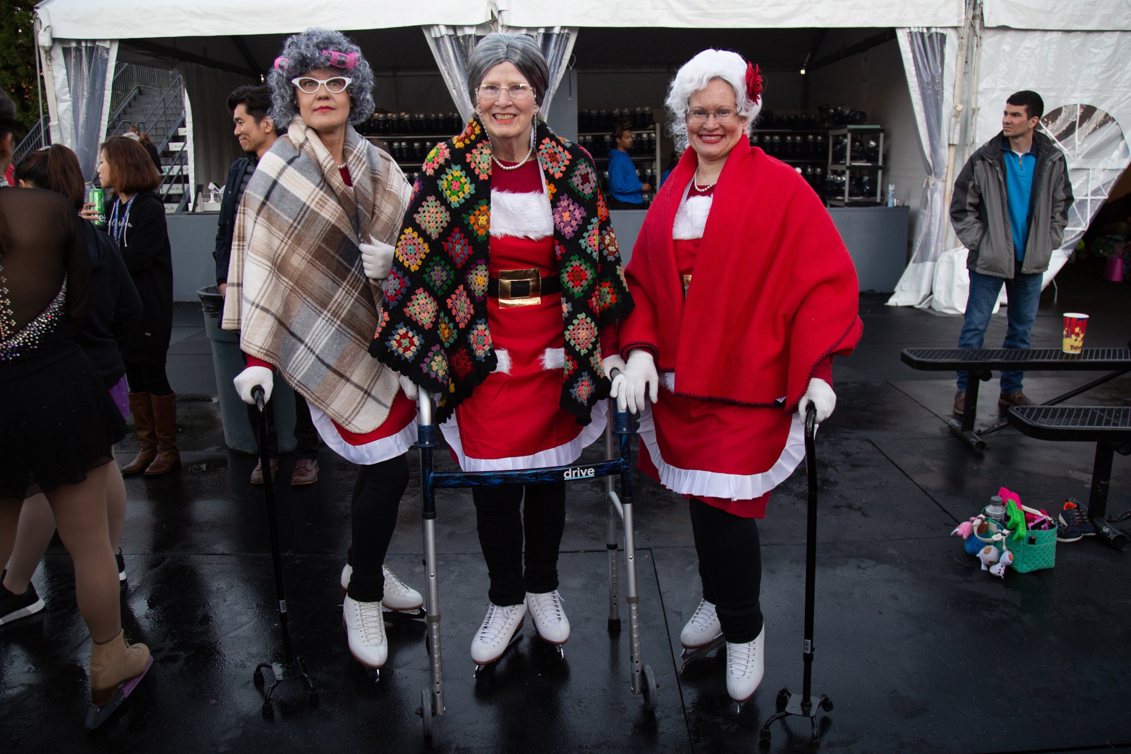 Figer skaters Tea Jinnila, Judith Flair, and Cathy Sabella get ready to perform during the Lighting of Atlantic Station event Saturday, November 23, 2019. STEVE SCHAEFER / SPECIAL TO THE AJC