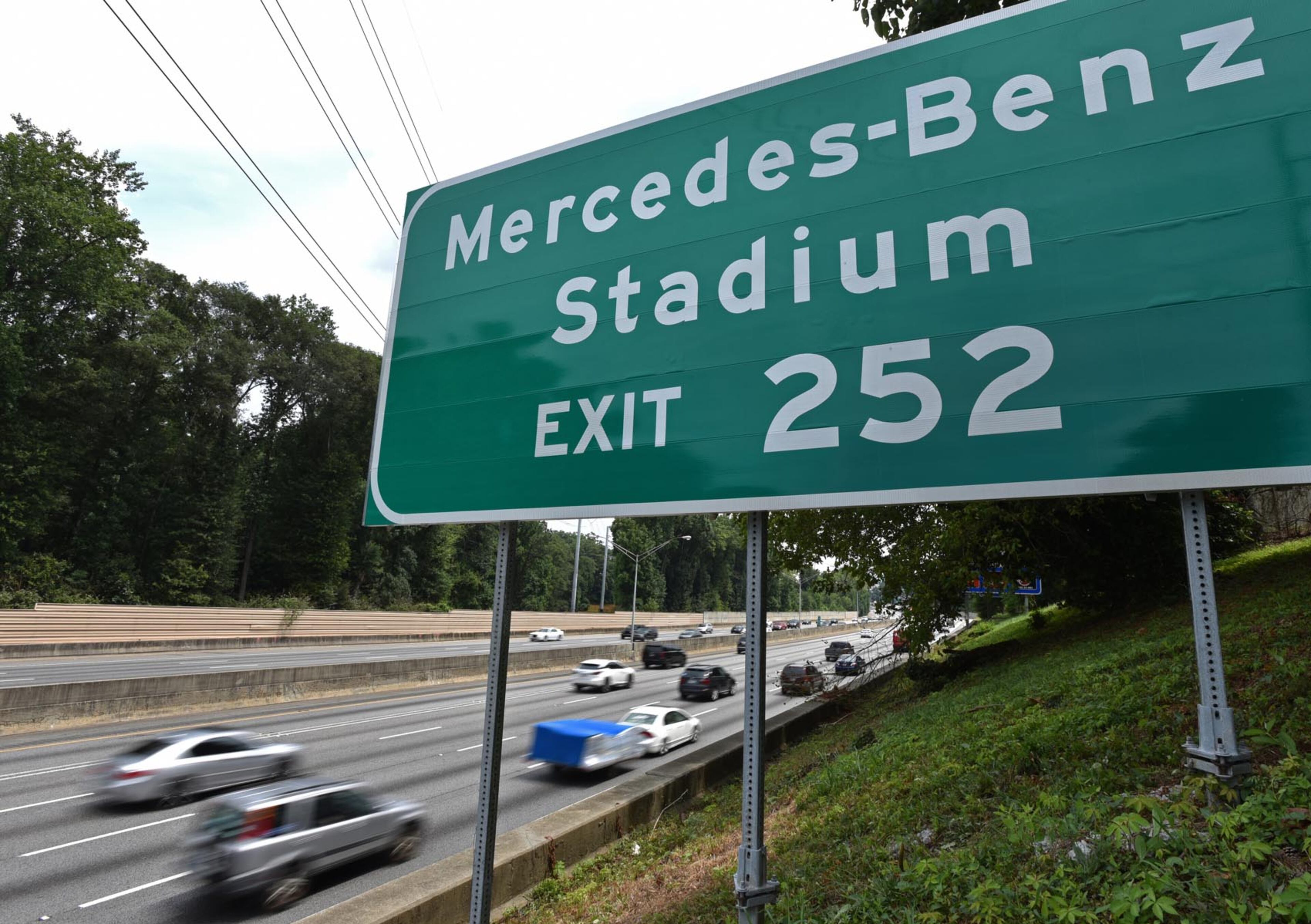 July 25, 2017 Atlanta - New "Mercedes-Benz Stadium" signage was swapped out by GDOT from "Georgia Dome" on I-75 southbound near the Northside Drive exit on Tuesday, July 25, 2017. HYOSUB SHIN / HSHIN@AJC.COM