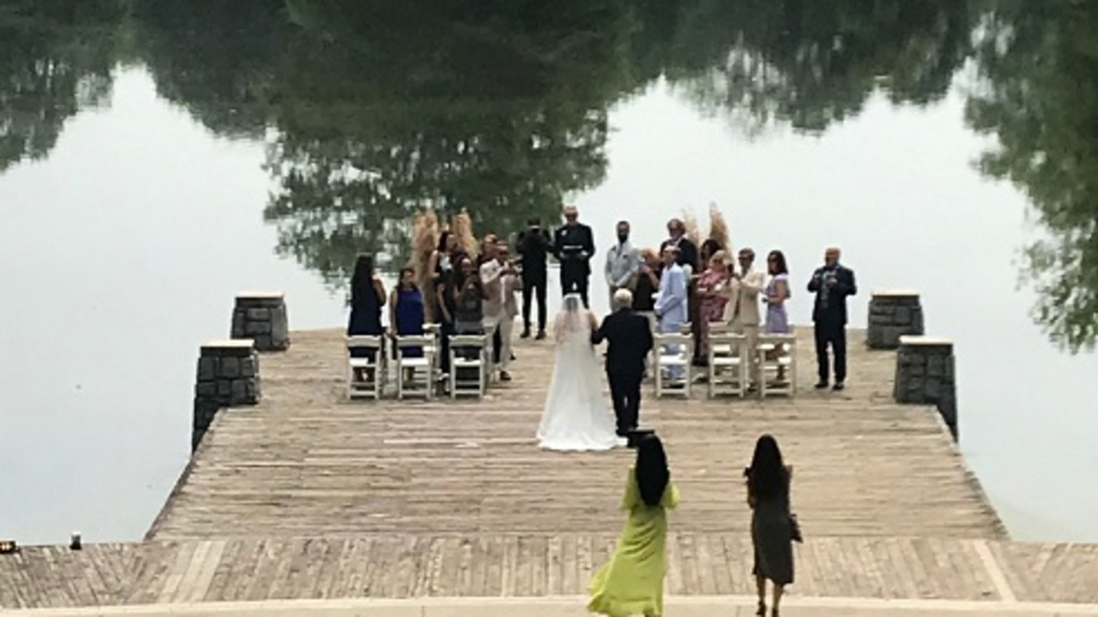 Nancy Hallman and Chris Partido did not have a wedding planned during the pandemic, but did not want to go through what hundreds of other couples have gone through and might continue to do with a possible 2nd wave of COVID-19. Eloping was the next best thing. The couple chose to have their ceremony at Piedmont Park’s historic Lake Clara Meer with family and close friends last weekend. Photo contributed.