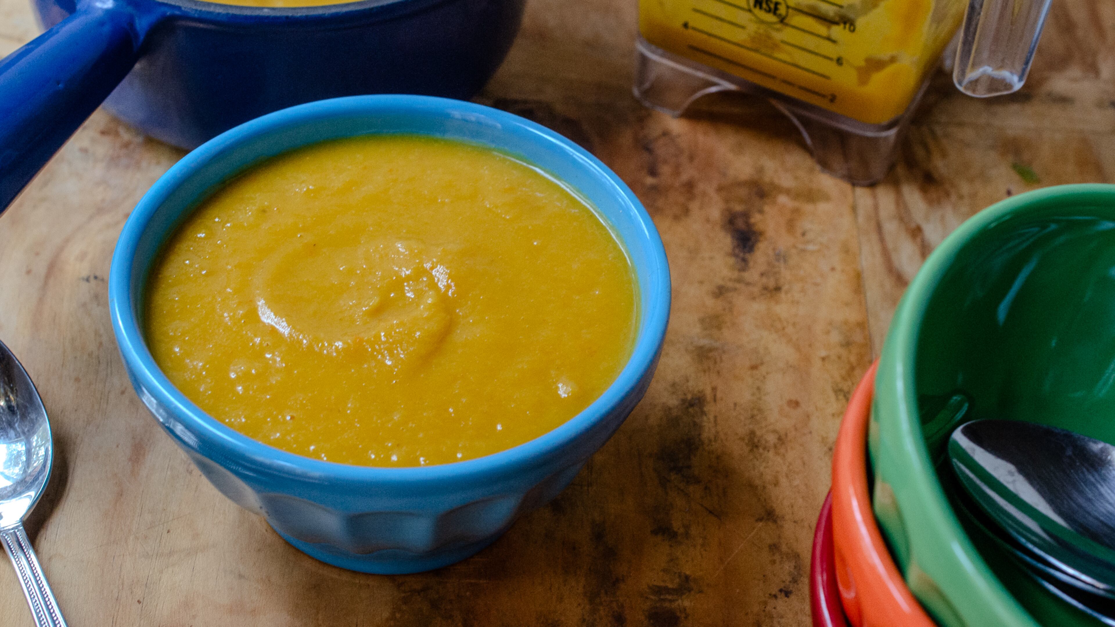 A bright and vibrant bowl of Sheet Pan Butternut Squash soup is a winner for nearly hands-free cooking. (Virginia Willis for The Atlanta Journal-Constitution)