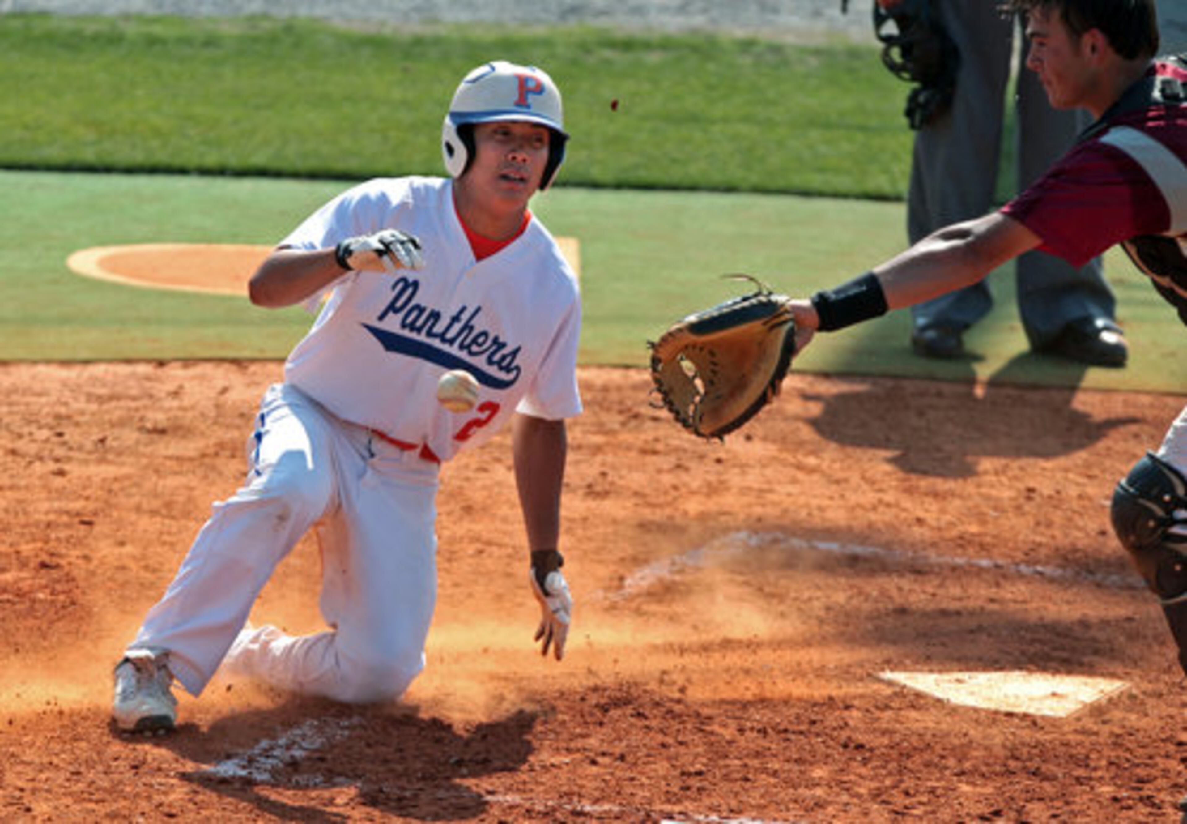 Parkview's Jeff Ronpirin (2) scores a run in the Panthers' 6-5 win over Hillgrove in the first game of the Class AAAAA state baseball final.