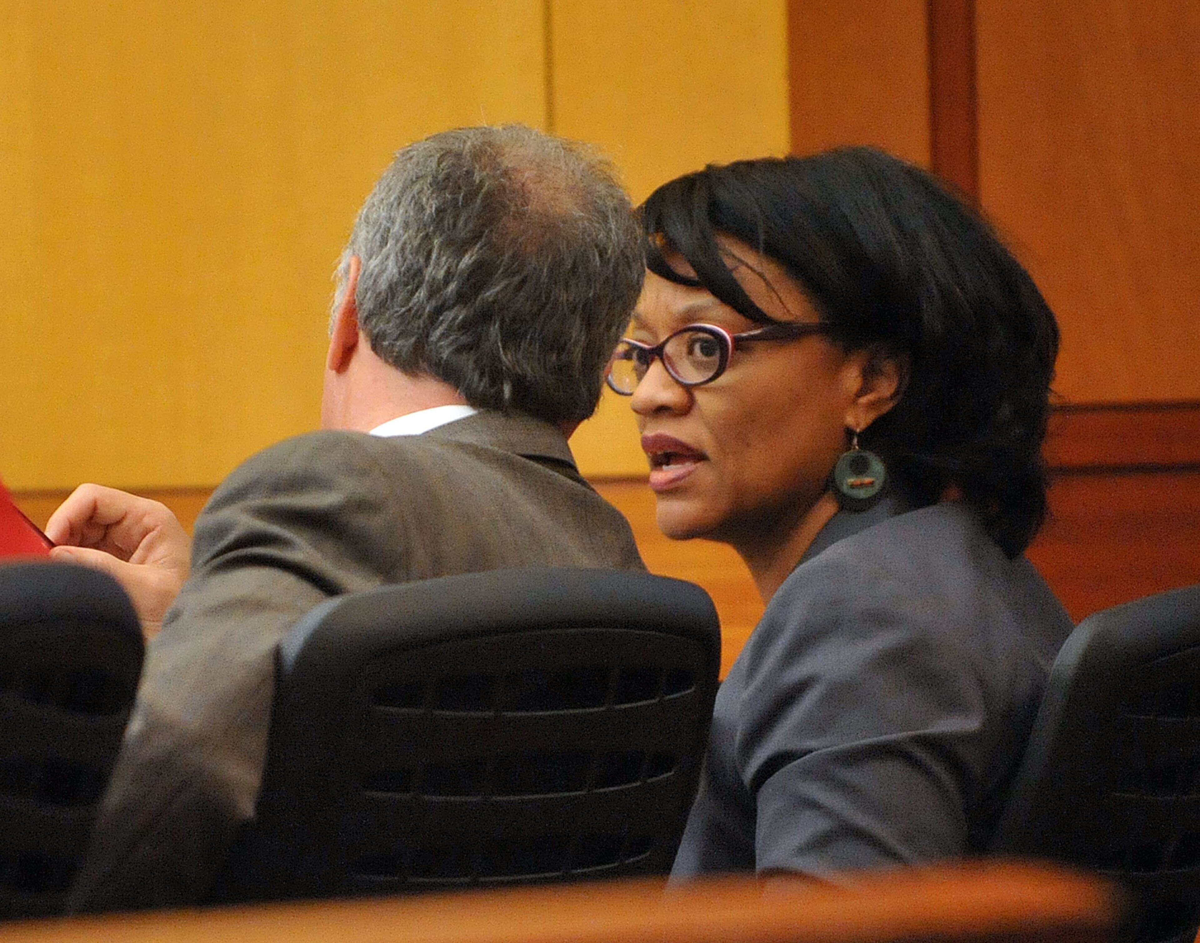 Former APS Dobbs Elementary principal Dana Evans and her defense attorney Robert Rubin confer as former Parks Middle School Principal Christopher Waller resumes his testimony under cross examination. KENT D. JOHNSON / KDJOHNSON@AJC.COM
