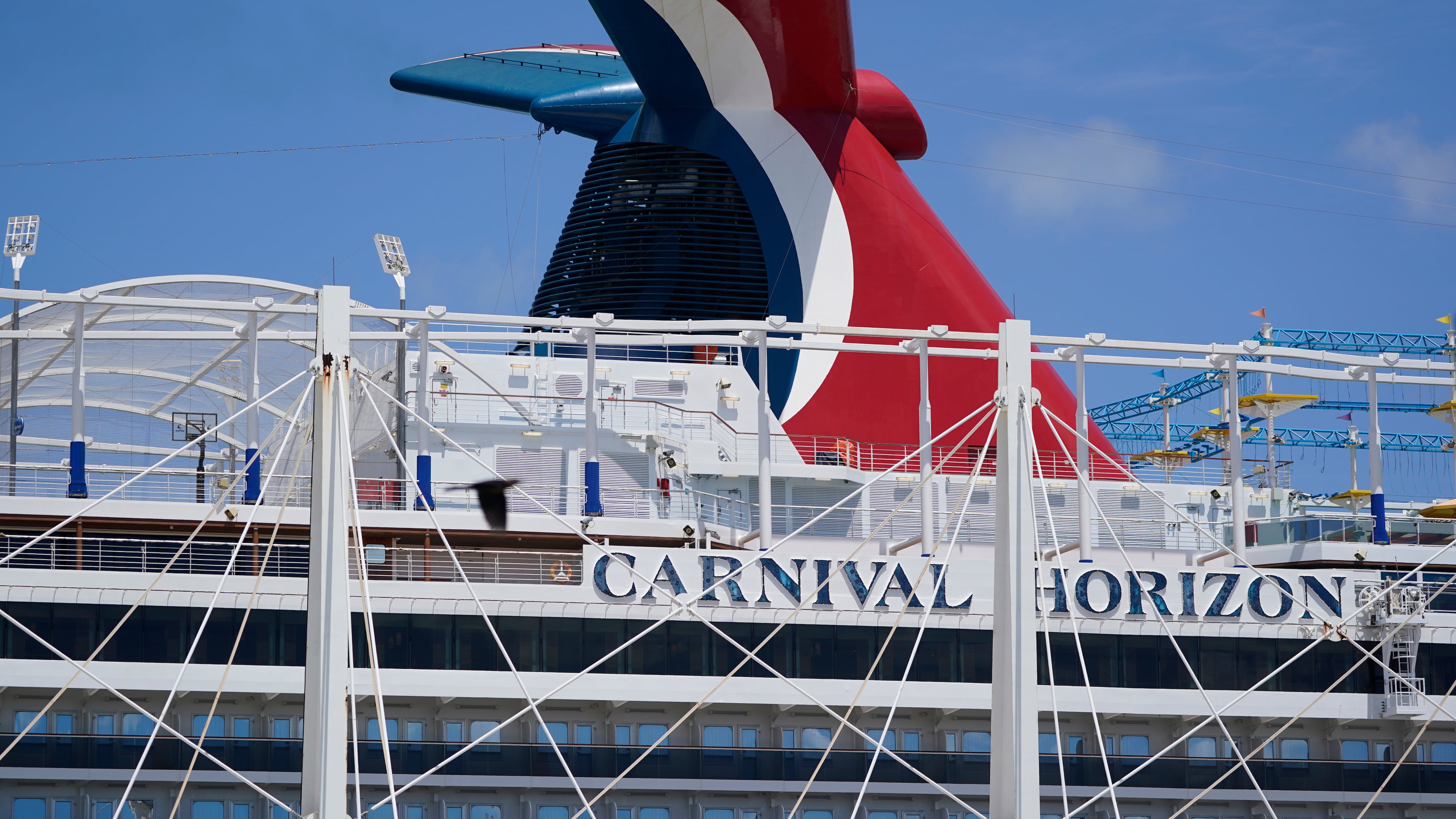 FILE - Carnival Cruise Line's Carnival Horizon cruise ship is shown docked at PortMiami, April 9, 2021, in Miami. (AP Photo/Wilfredo Lee, file)