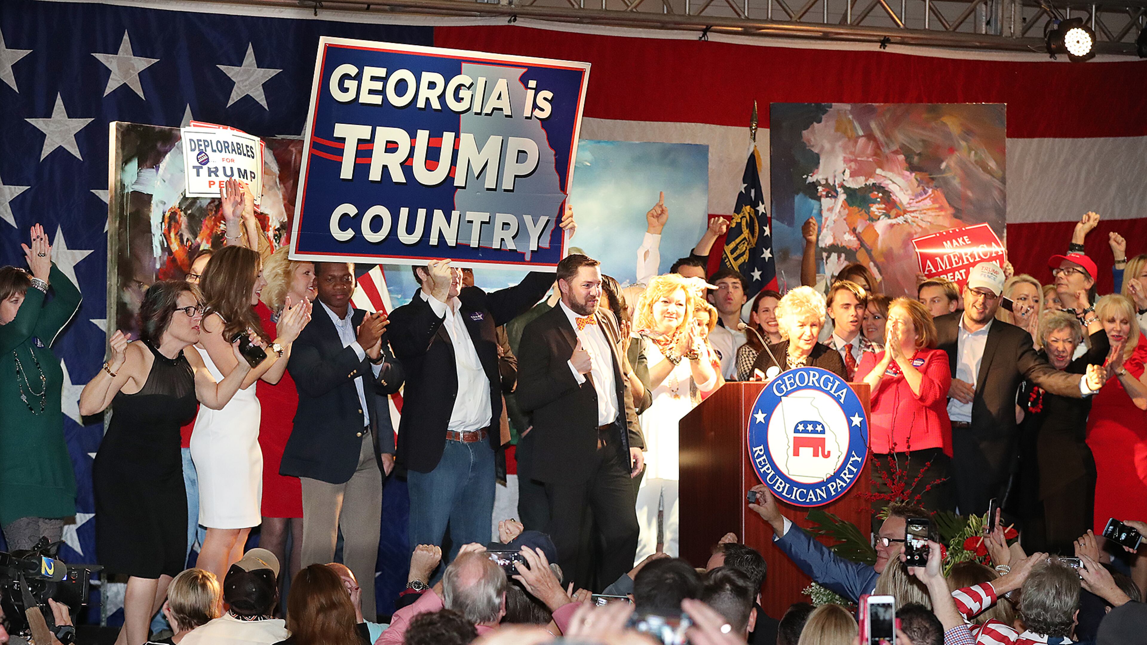 Republican voters celebrate Donald Trump’s victory in Georgia last November. Curtis Compton, ccompton@ajc.com