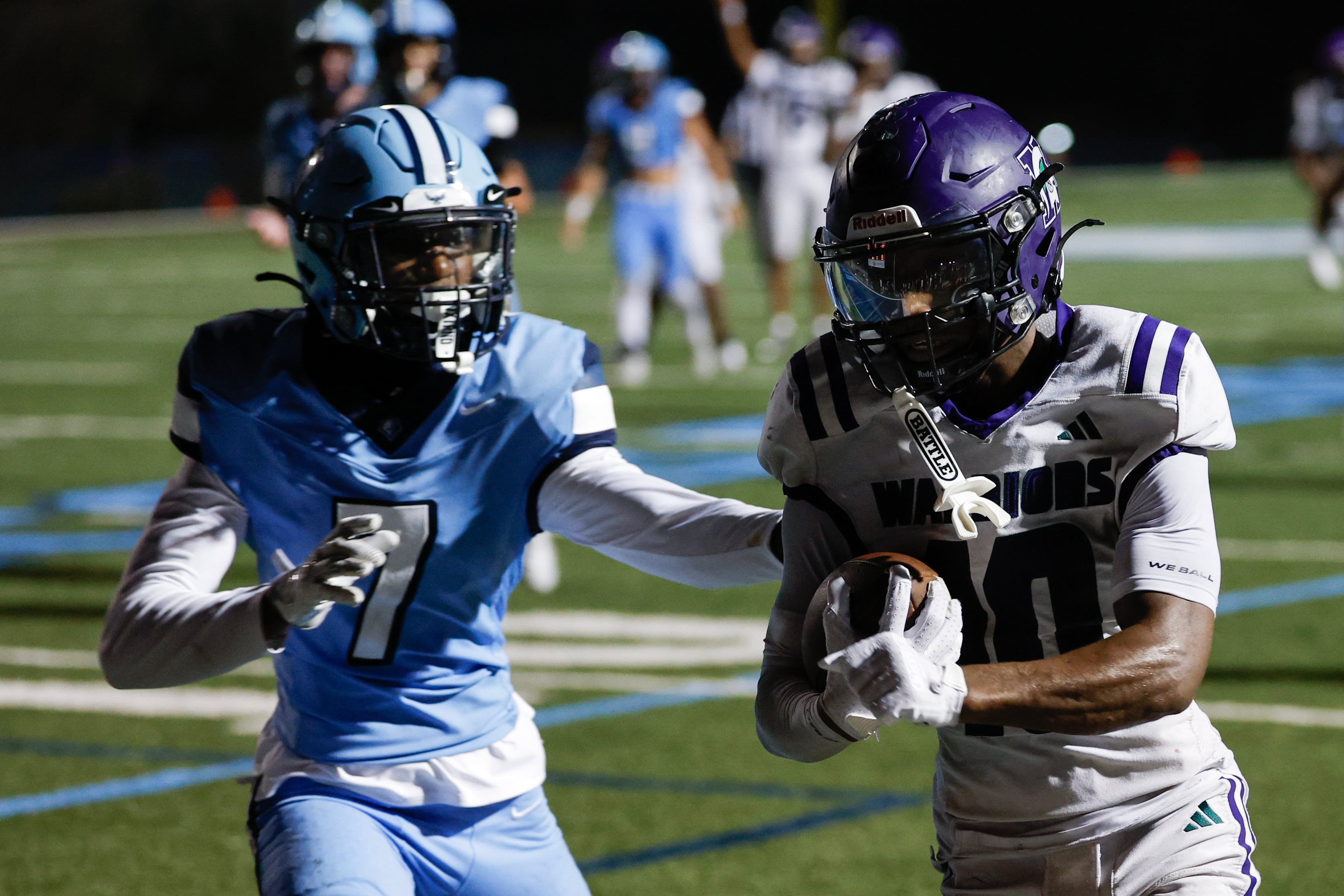 KIPP Atlanta’s Cephas Barnett (right) runs for a touchdown against North Cobb Christian’s Jason Smith during their game on Friday, Oct. 2, 2026, in Kennesaw. (Erik S. Lesser for the AJC)