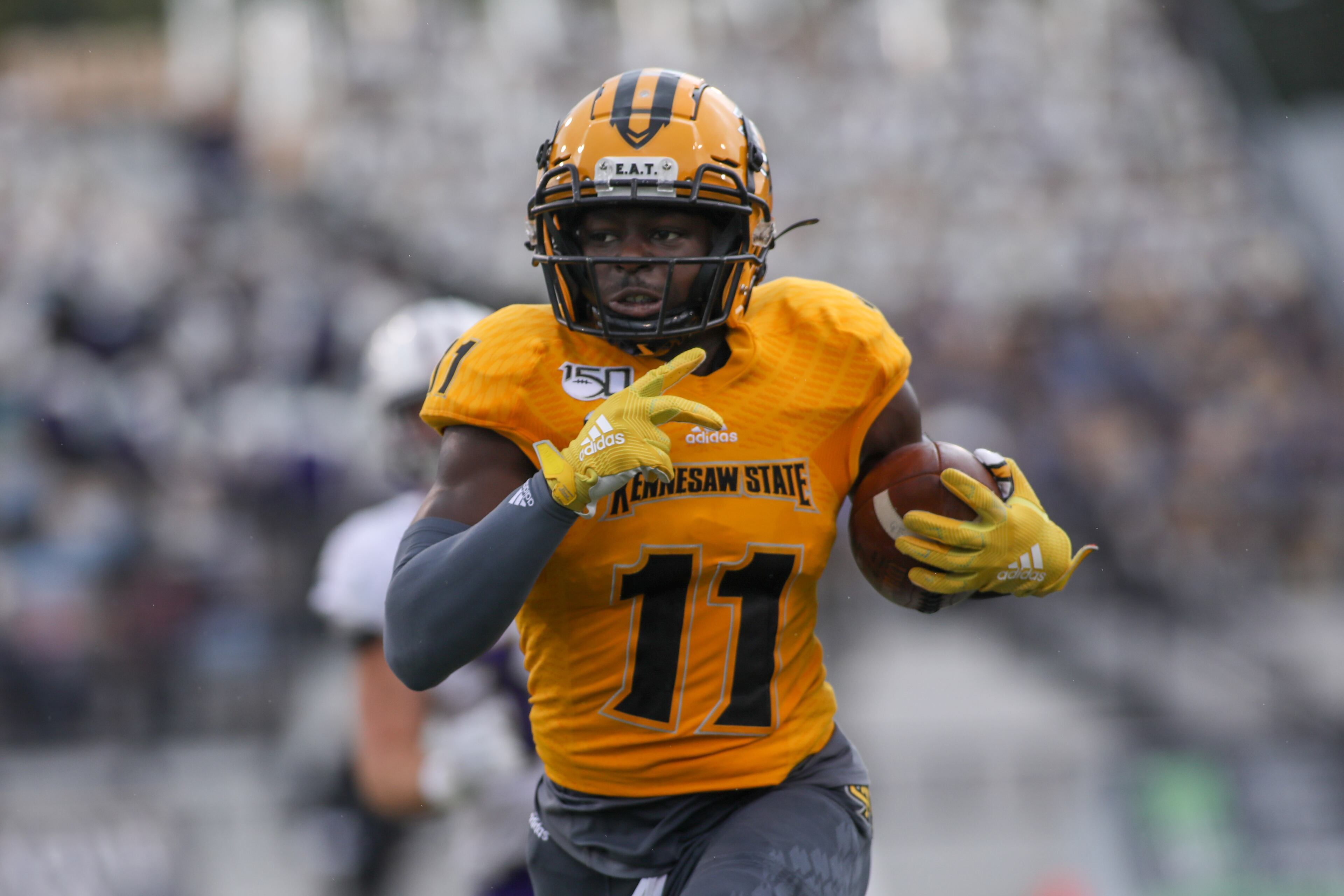 Kennesaw State Owls running back Kevin Ficklin (22) runs the ball against North Alabama Lions at Fifth Third Bank Stadium, Saturday, Oct. 26, 2019, in Kennesaw, Ga. BRANDEN CAMP/SPECIAL