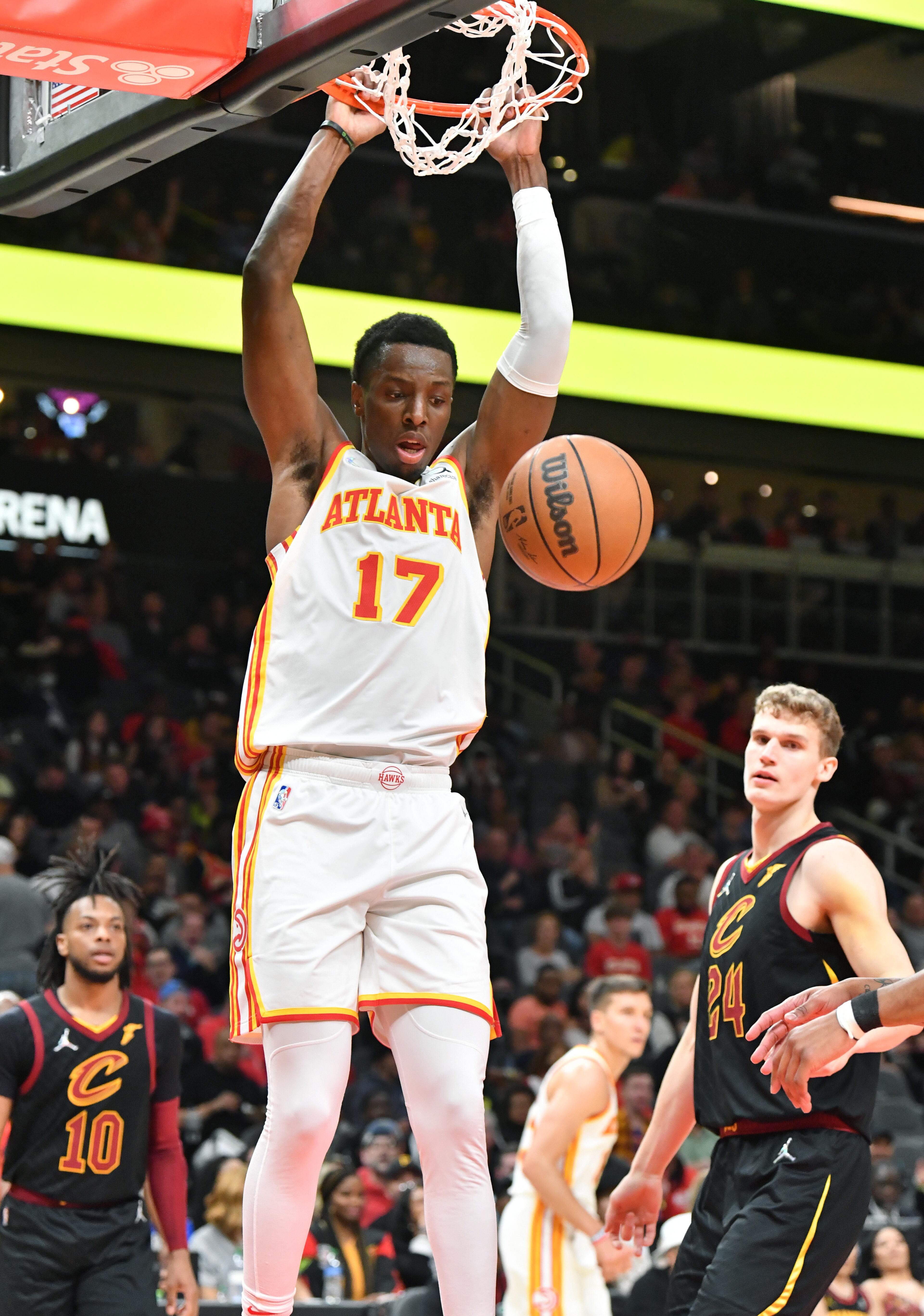 Hawks' forward Onyeka Okongwu (17) dunks the ball during the first half in an NBA basketball game at State Farm Arena on Thursday, March 31, 2022. Atlanta Hawks won 131-107 over Cleveland Cavaliers. (Hyosub Shin / Hyosub.Shin@ajc.com)