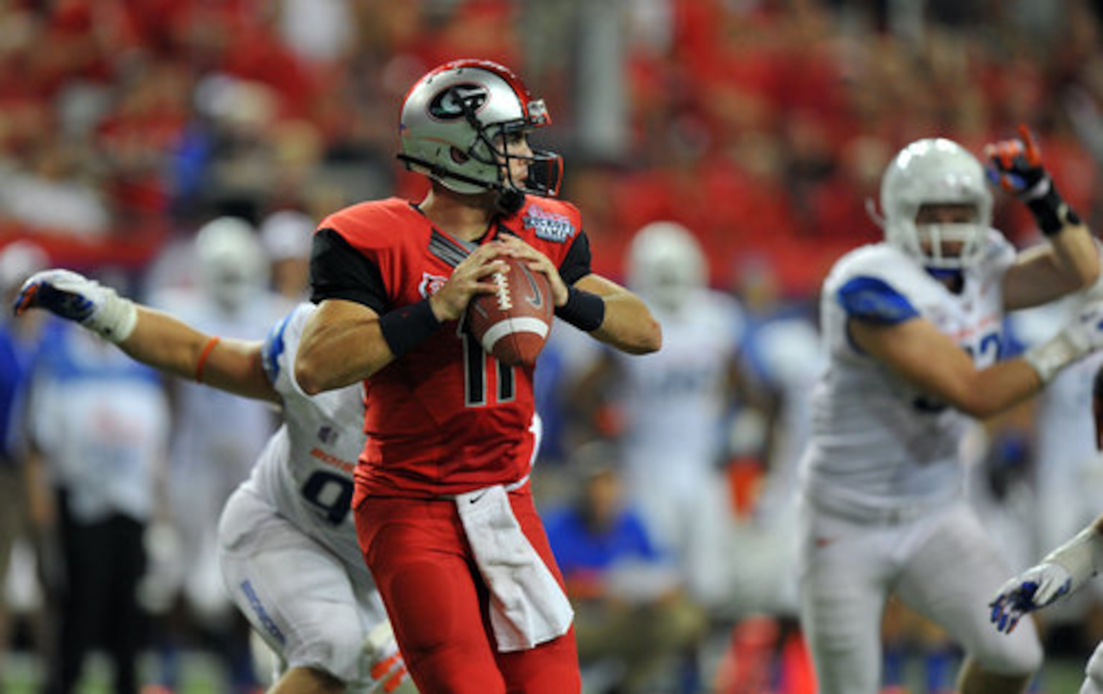 Georgia quarterback Aaron Murray throws under pressure during the second quarter against Boise State.