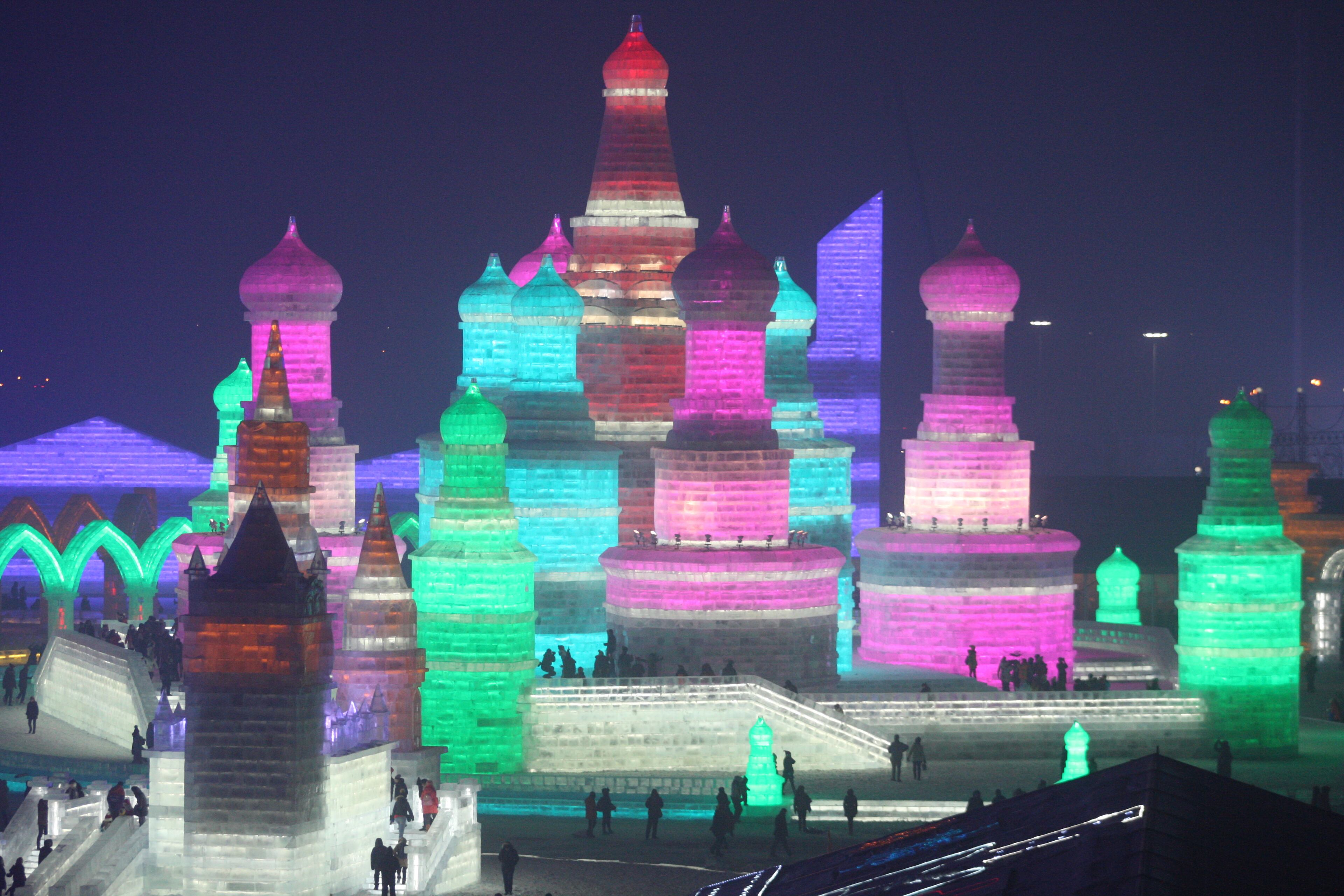 HARBIN, CHINA - DECEMBER 22: (CHINA OUT) Tourists visit the 17th Harbin Ice And Snow World during its test run on December 22, 2015 in Harbin, China. The event will run from December 25, 2015 to February 25, 2016. (Photo by ChinaFotoPress/ChinaFotoPress via Getty Images)