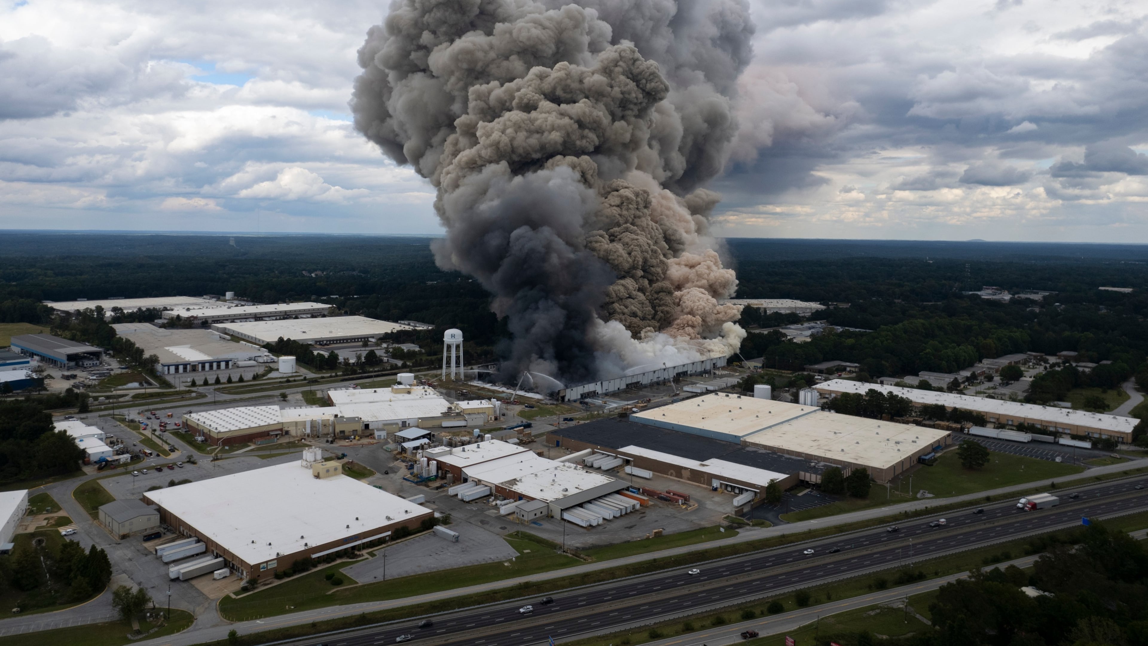 FILE - Smoke billows from a fire at the BioLab facility in Conyers, Ga., Sunday, Sept. 29, 2024. (Ben Gray/Atlanta Journal-Constitution via AP, file)