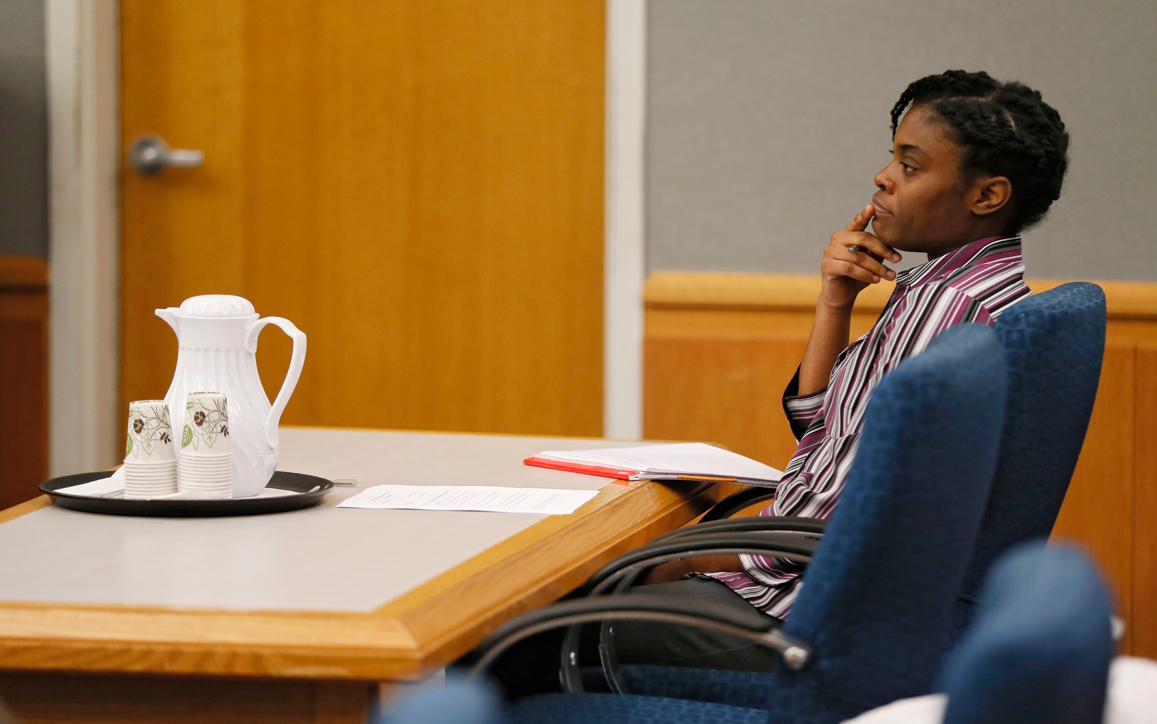 April 25, 2019 - Lawrenceville - Tiffany Moss showed little emotion during the testimony of Emani Moss' father, Eman Moss, at her capital murder trial. Eman Moss agreed to a plea deal that allowed him t avoid the penalty in exchange for testifying against Tiffany Moss. The prosecution continued for the second day in the Tiffany Moss death penalty trial with the testimony of Eman Moss. Moss, who is representing herself, again declined to ask questions of the prosecution witnesses. Bob Andres / bandres@ajc.com