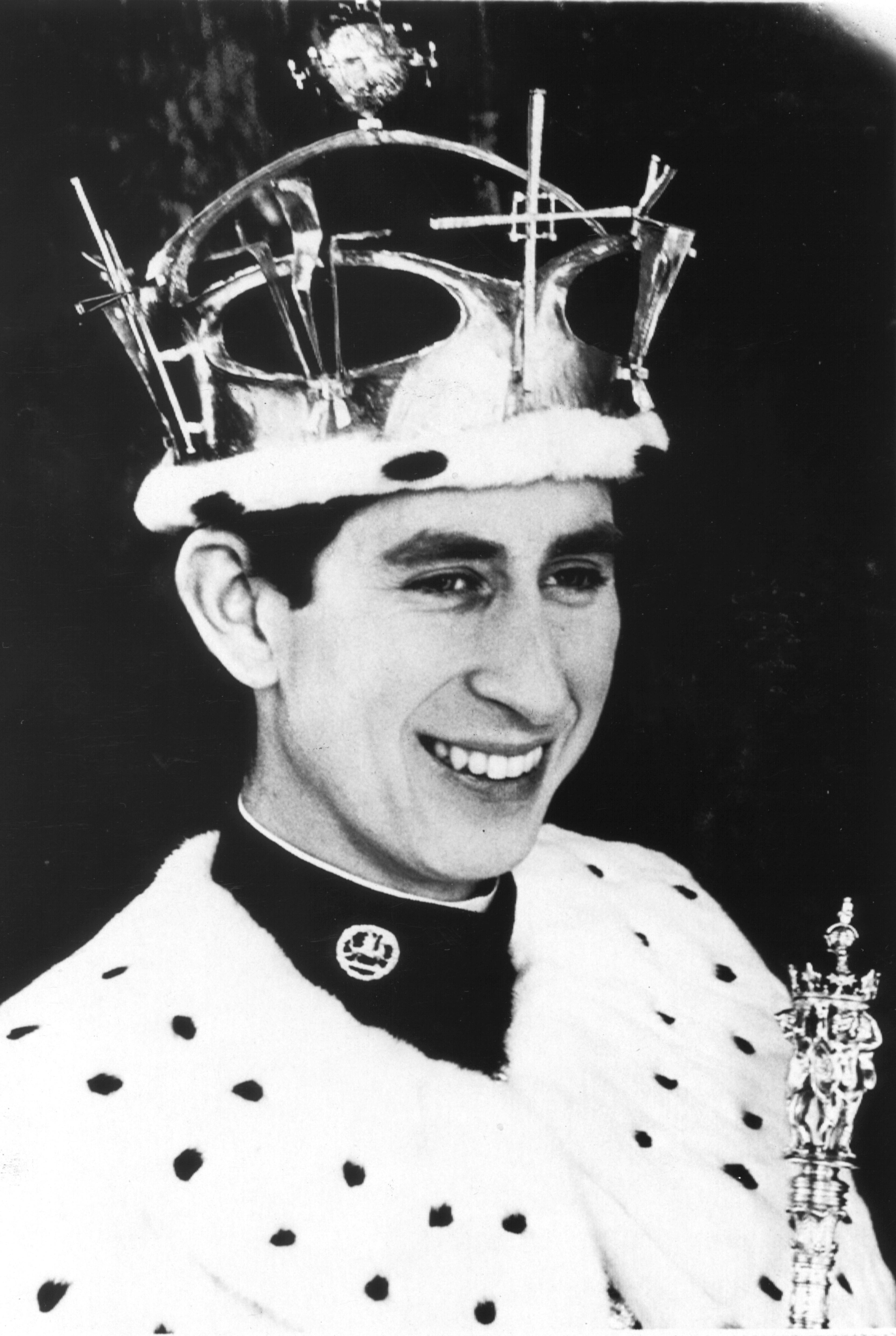 Prince Charles is shown in his investiture regalia as the Prince of Wales in this 1969 photo. The 20-year-old heir to the British throne wears a gold coronet and an ermine cape and holds a scepter.