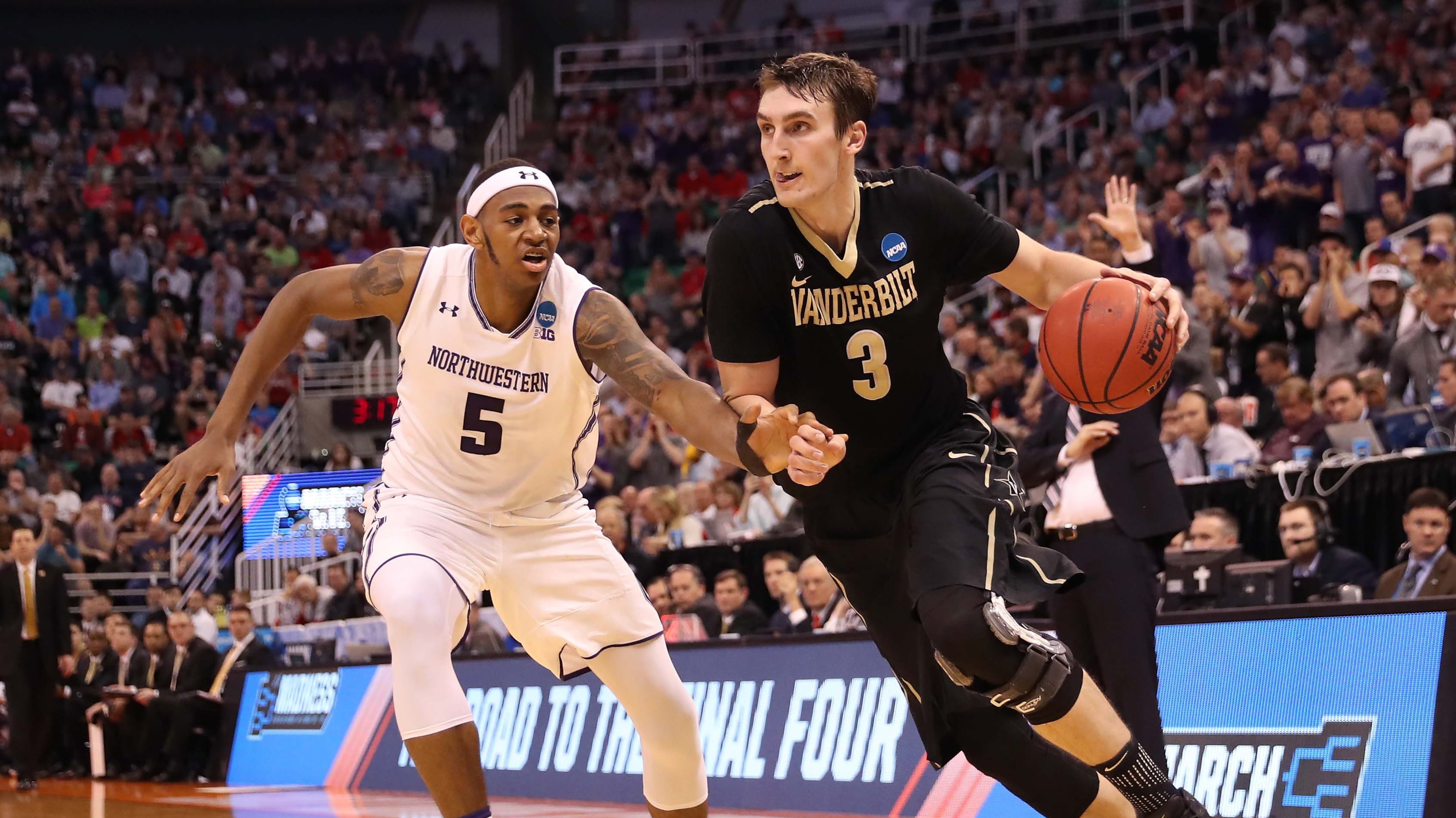 Luke Kornet (3) of the Vanderbilt Commodores drives against Dererk Pardon (5) of the Northwestern Wildcats in the first half during the first round of the 2017 NCAA Men’s Basketball Tournament at Vivint Smart Home Arena on March 16, 2017 in Salt Lake City, Utah. (Photo by Christian Petersen/Getty Images)