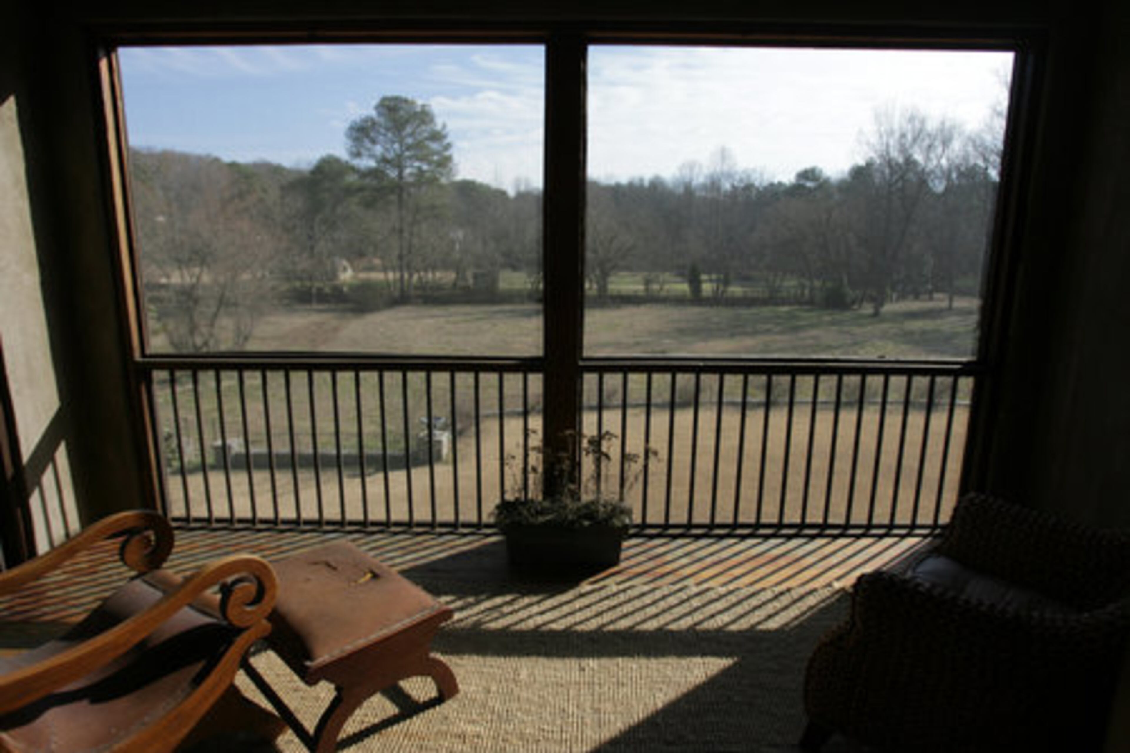 Most of the year, Meridy and Woody leave open the doors to their bedroom patio. "You hear the crickets and the frogs and all the animals," she says.