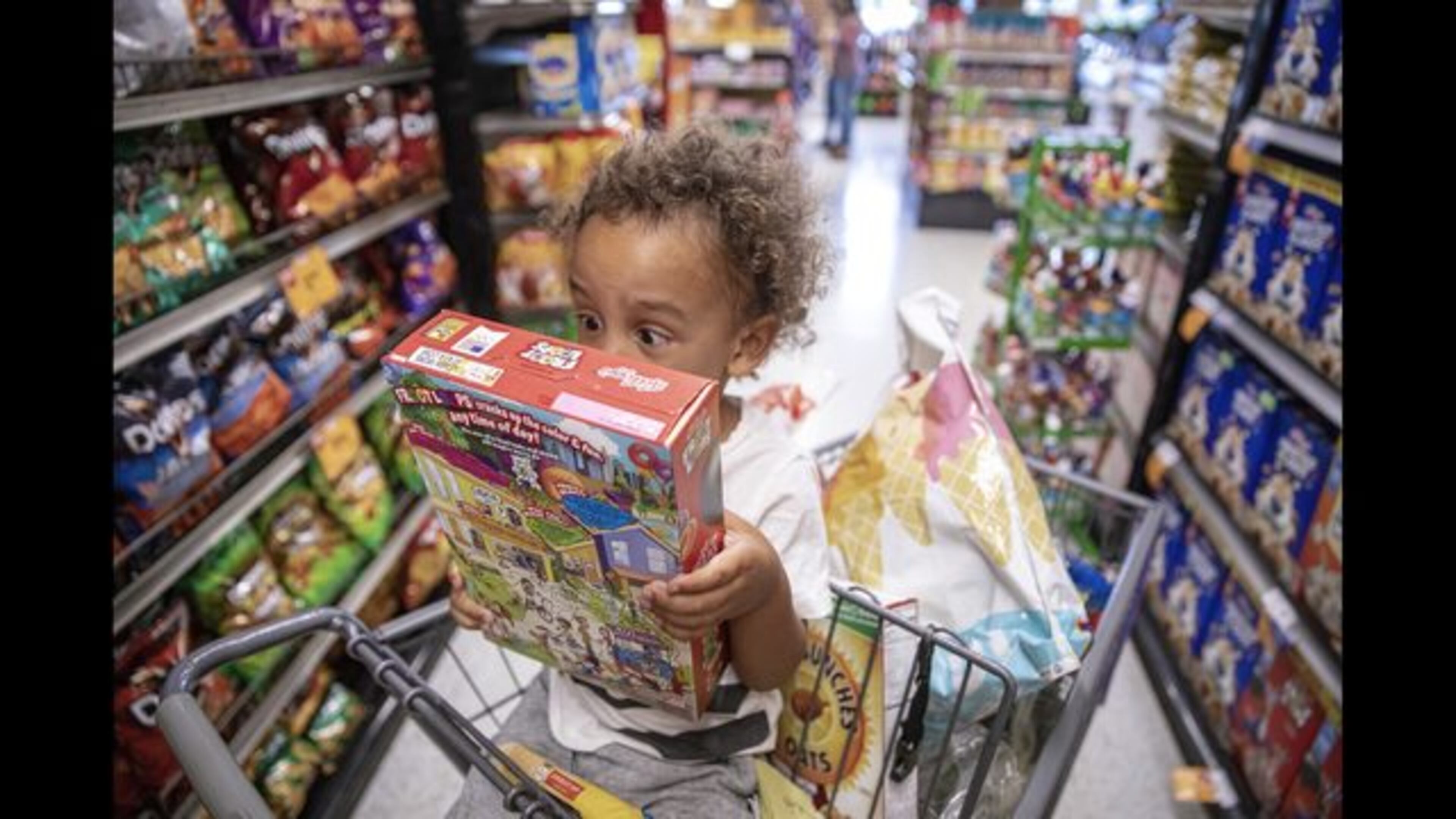 In this Friday, Aug. 9, 2019, photo, employees work at Growing Home, Inc's farm in Chicago's neighborhood of Englewood. Atlanta, Chicago and other large cities across the country are taking a multi-pronged approach to bringing healthy diets to "food deserts," mostly low-income neighborhoods located miles away from the nearest supermarket. (AP Photo/Amr Alfiky)