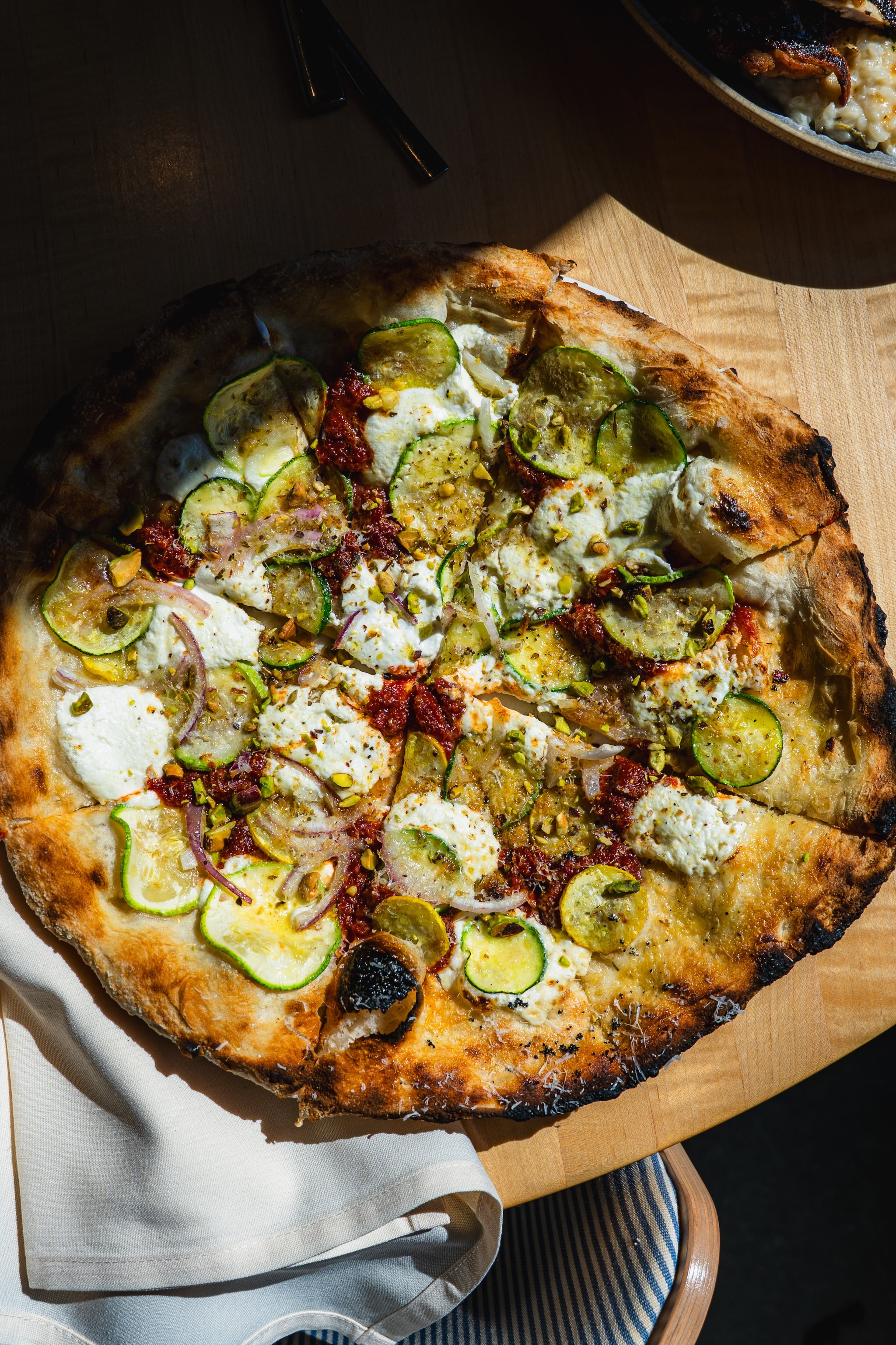 Local summer zucchini and ricotta tango on top of Indaco's wood-fired pizza. (Courtesy of Indaco)