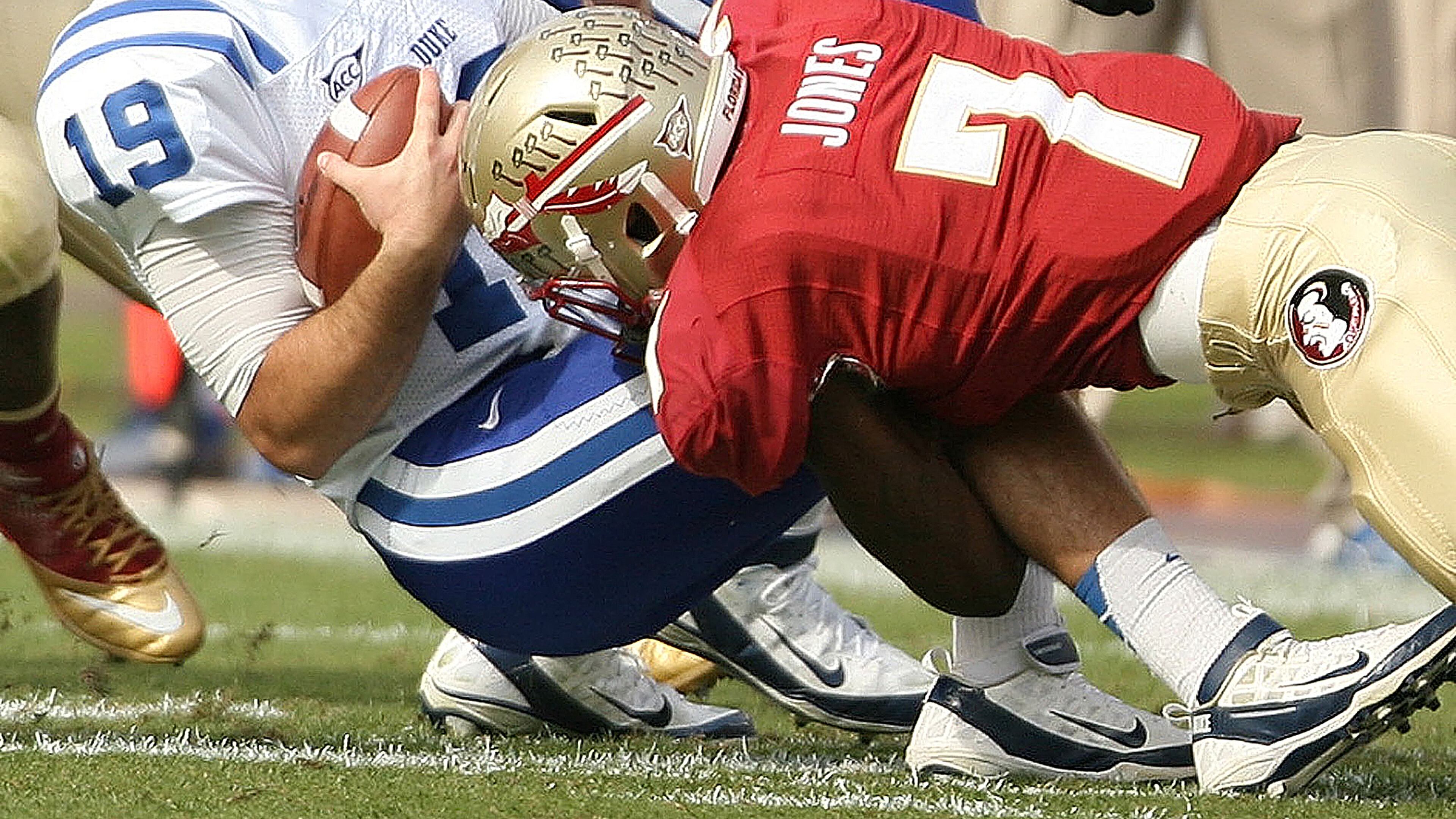 Florida State linebacker Christian Jones (7) hits Duke quarterback Sean Renfree (19) at Doak Campbell Stadium in Tallahassee, Florida, on Saturday, October 27, 2012. (Stephen M. Dowell/Orlando Sentinel/MCT)