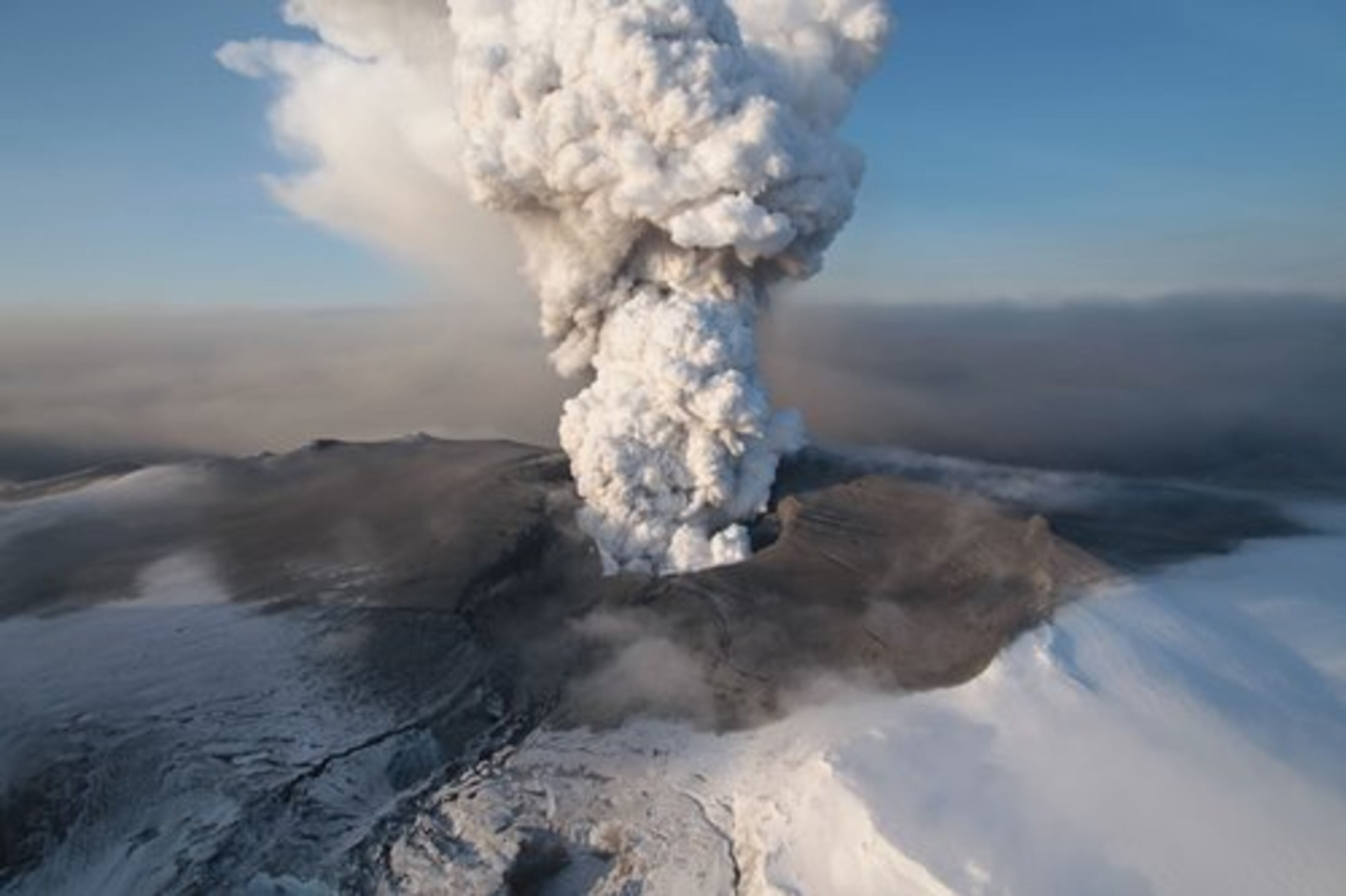 March 20, Eyjafjallaj kull, Iceland - On one of the small glaciers in Iceland, a volcanic eruption begins from Eyjafjallaj kull Volcano. Nearly a month later, a dark plume begins to rise from the crater following a second massive eruption. The volcanic ash becomes a major disruption for air travel across Europe, reaching as far south as Great Britain. For six days, airspace restrictions are in place grounding tens of thousands of flights and stranding hundreds of thousands of passengers.